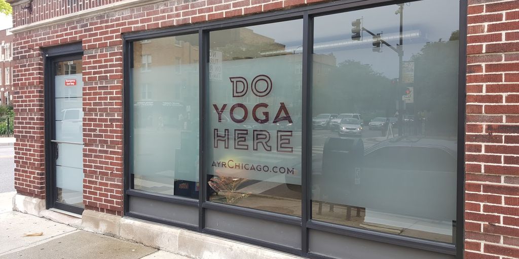 person washing yoga mat