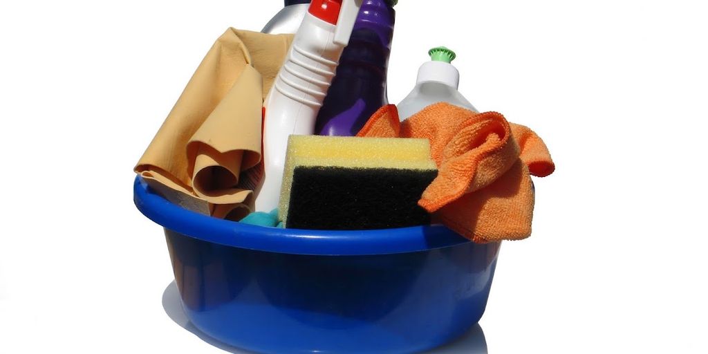 DIY yoga mat cleaner ingredients and tools on a wooden table