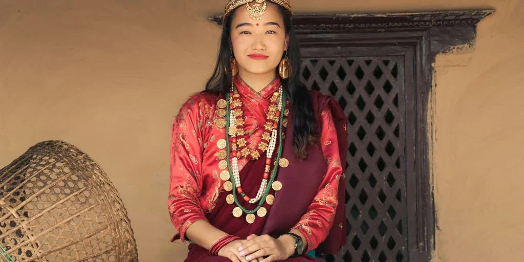 a person wearing a red dress and a crown