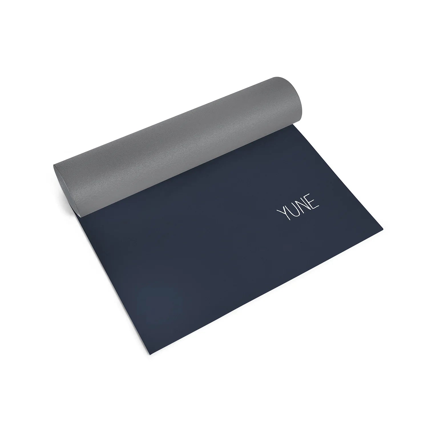 Yoga mat with gray top and navy bottom on a white background