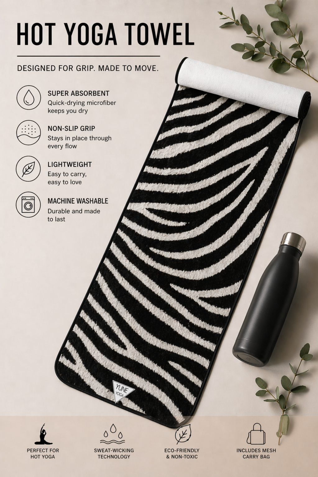 Hot yoga towel with zebra pattern and black water bottle on a beige background