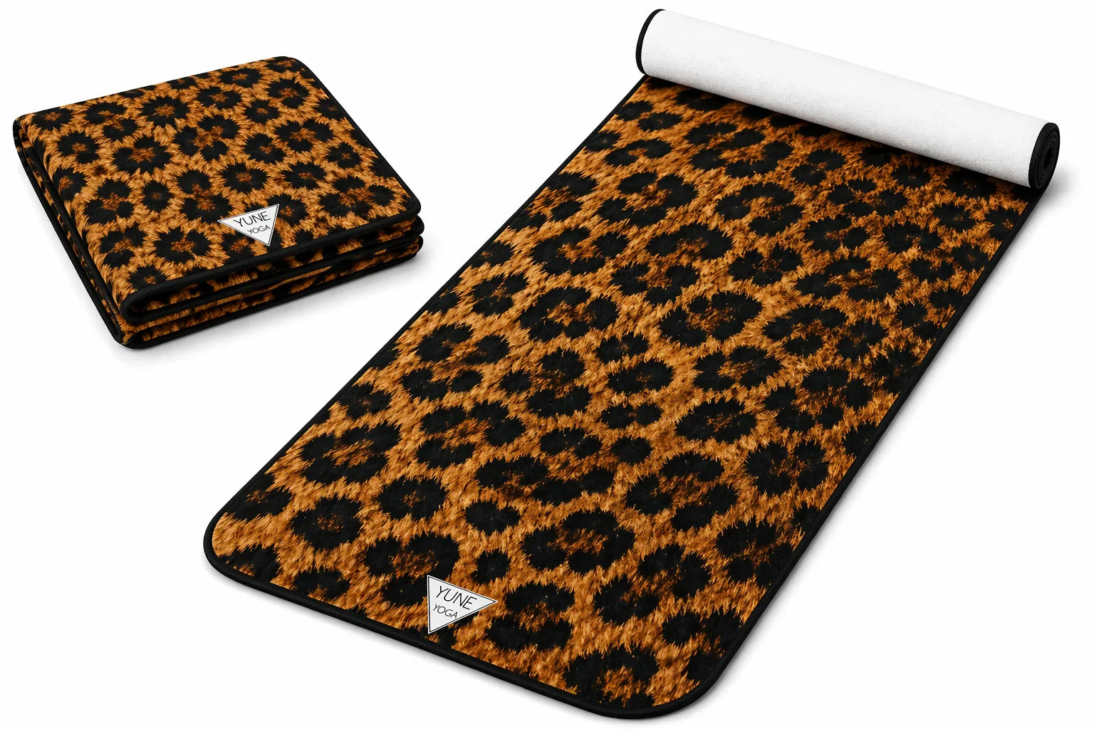 Leopard print yoga mat and folded yoga towel with bold animal pattern on white background