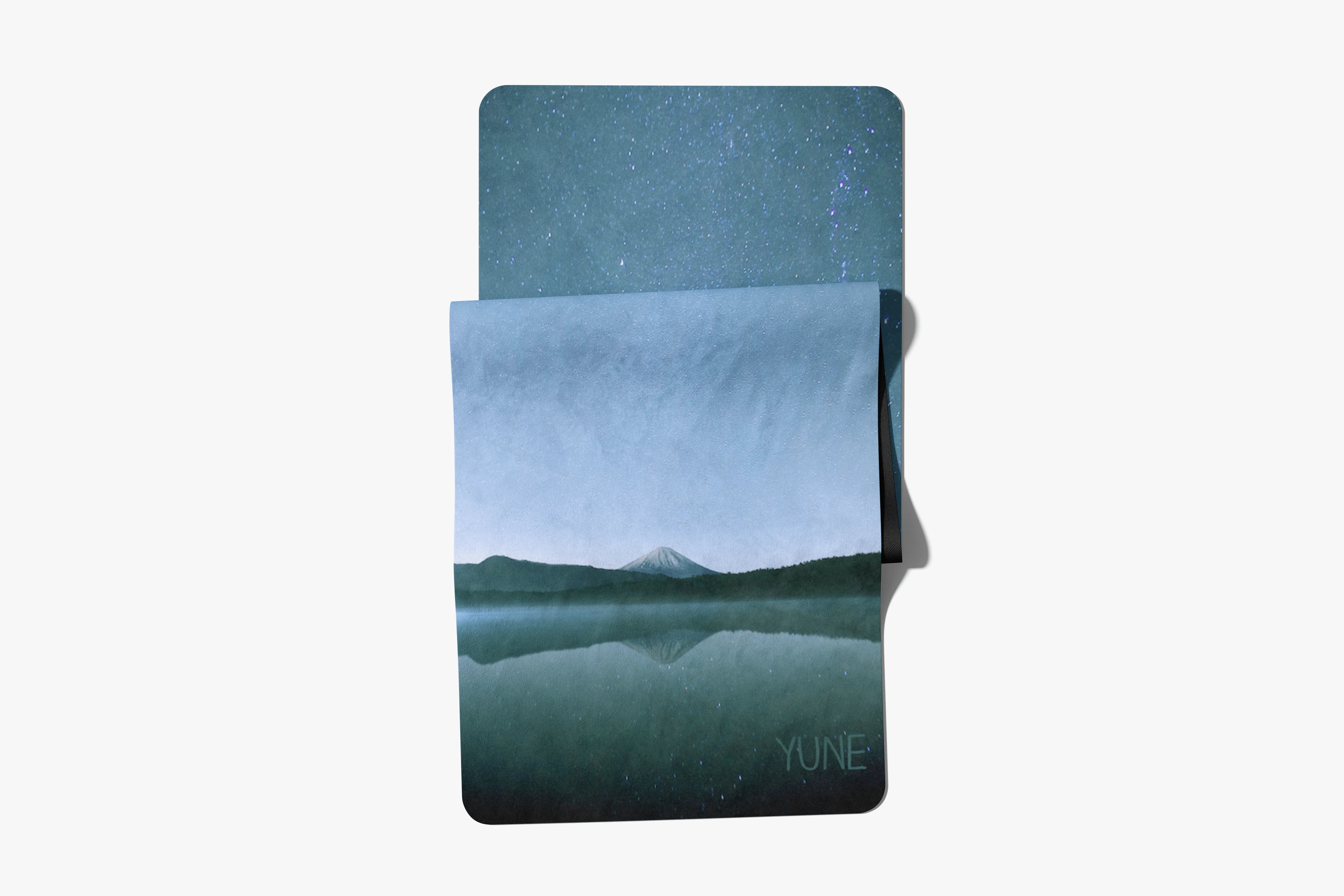 Notebook with a mountain landscape design on a white background