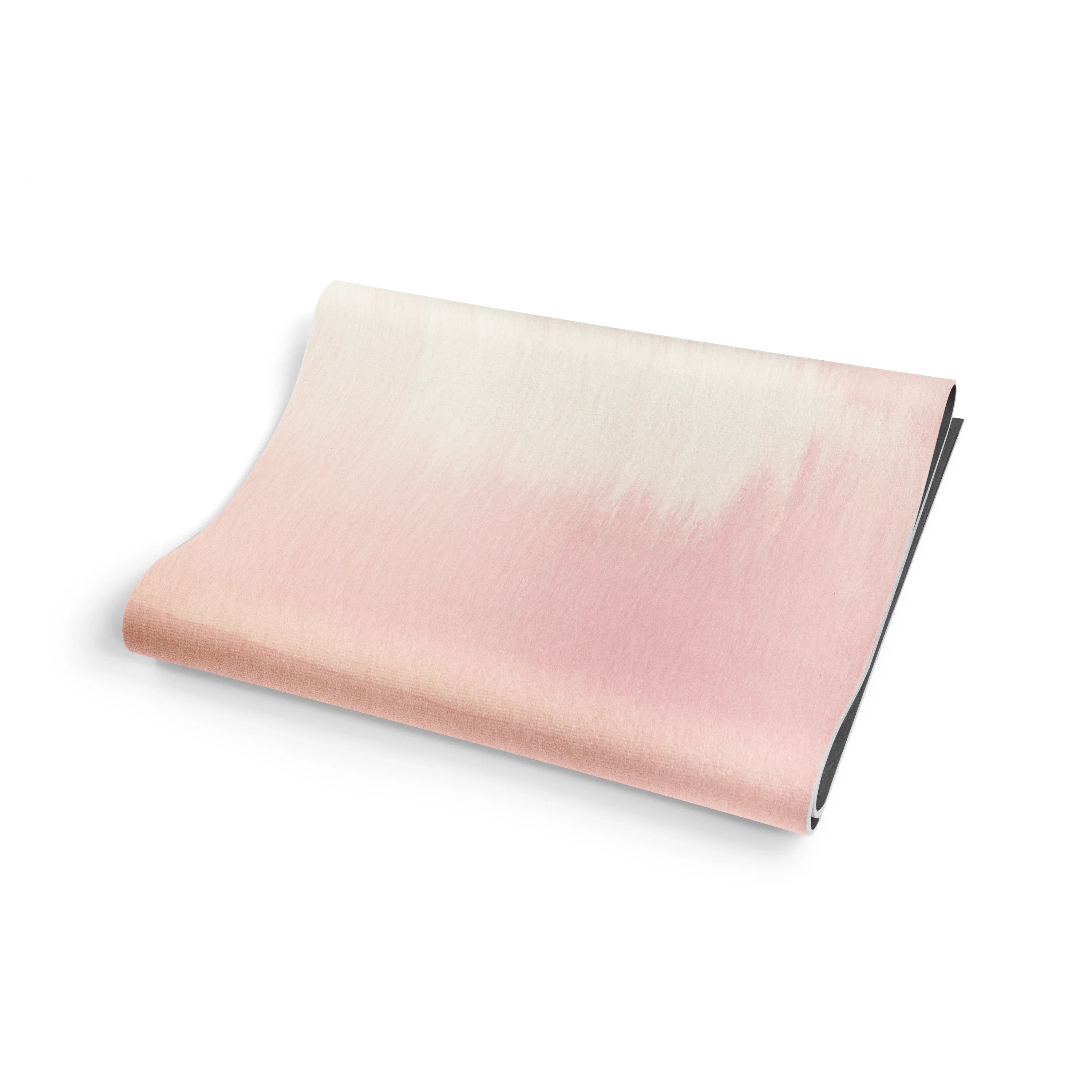 Pink and white gradient blanket on a white background