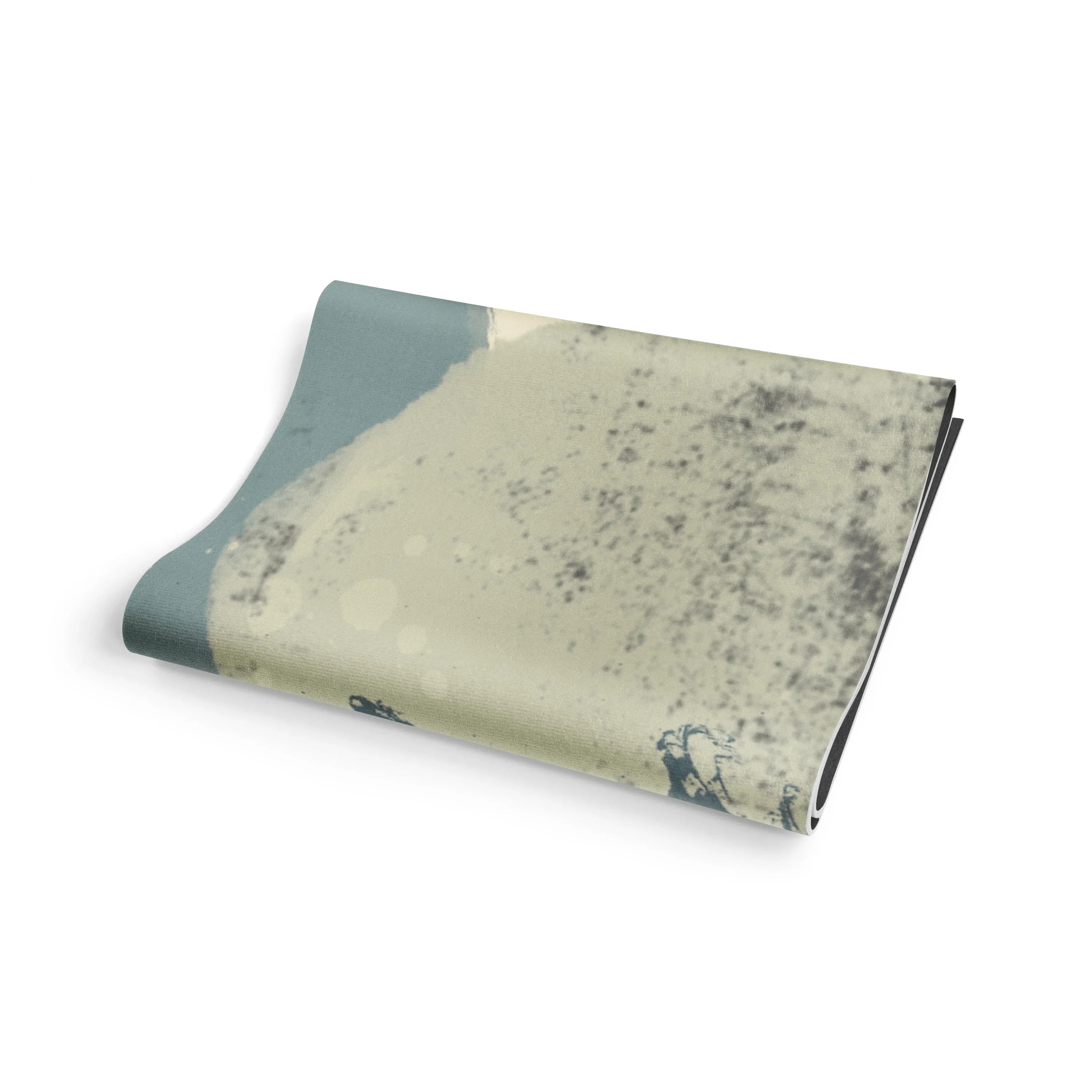 Folded fabric with a textured pattern on a white background