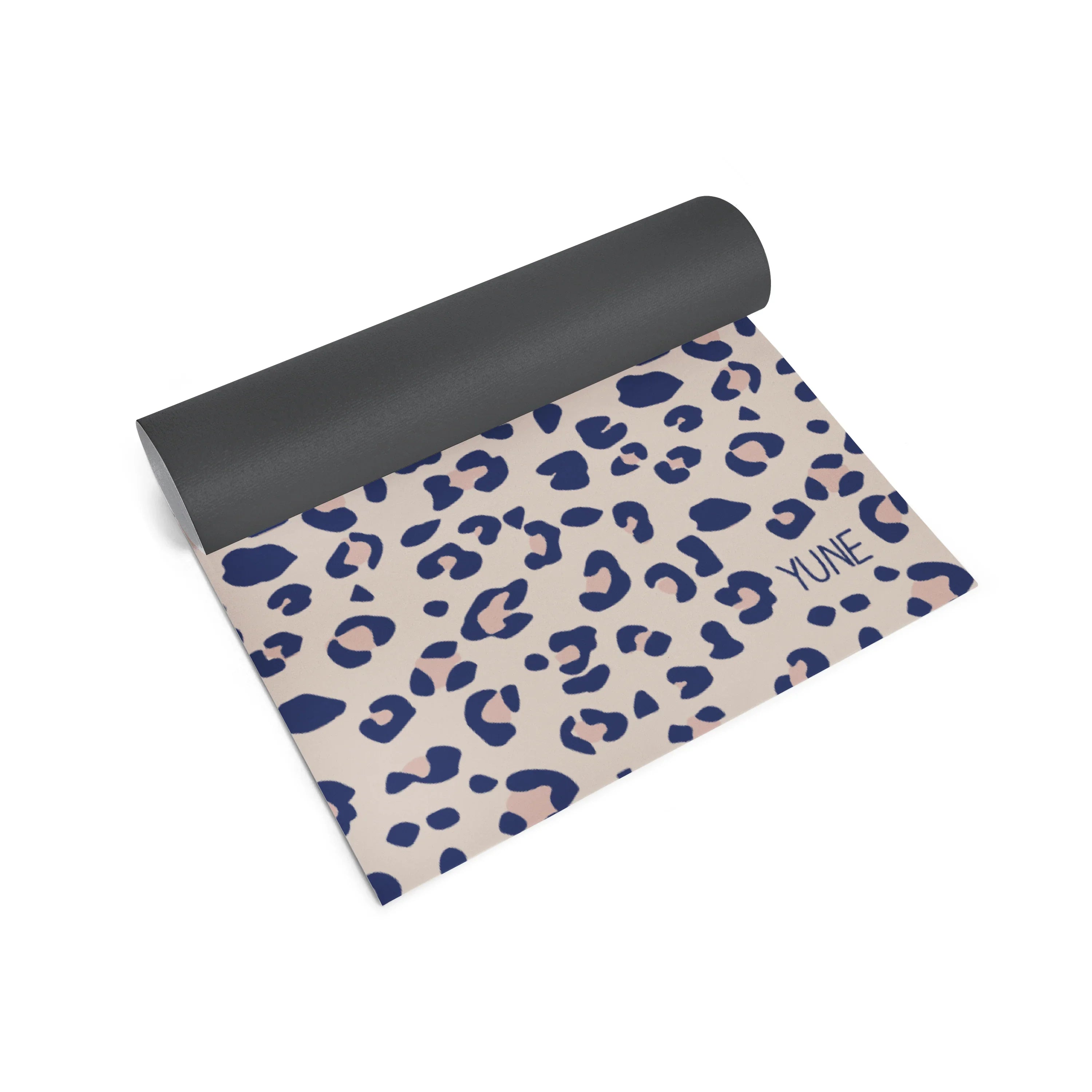 Yoga mat with blue leopard print pattern on a beige background, featuring the brand 'Yune'.