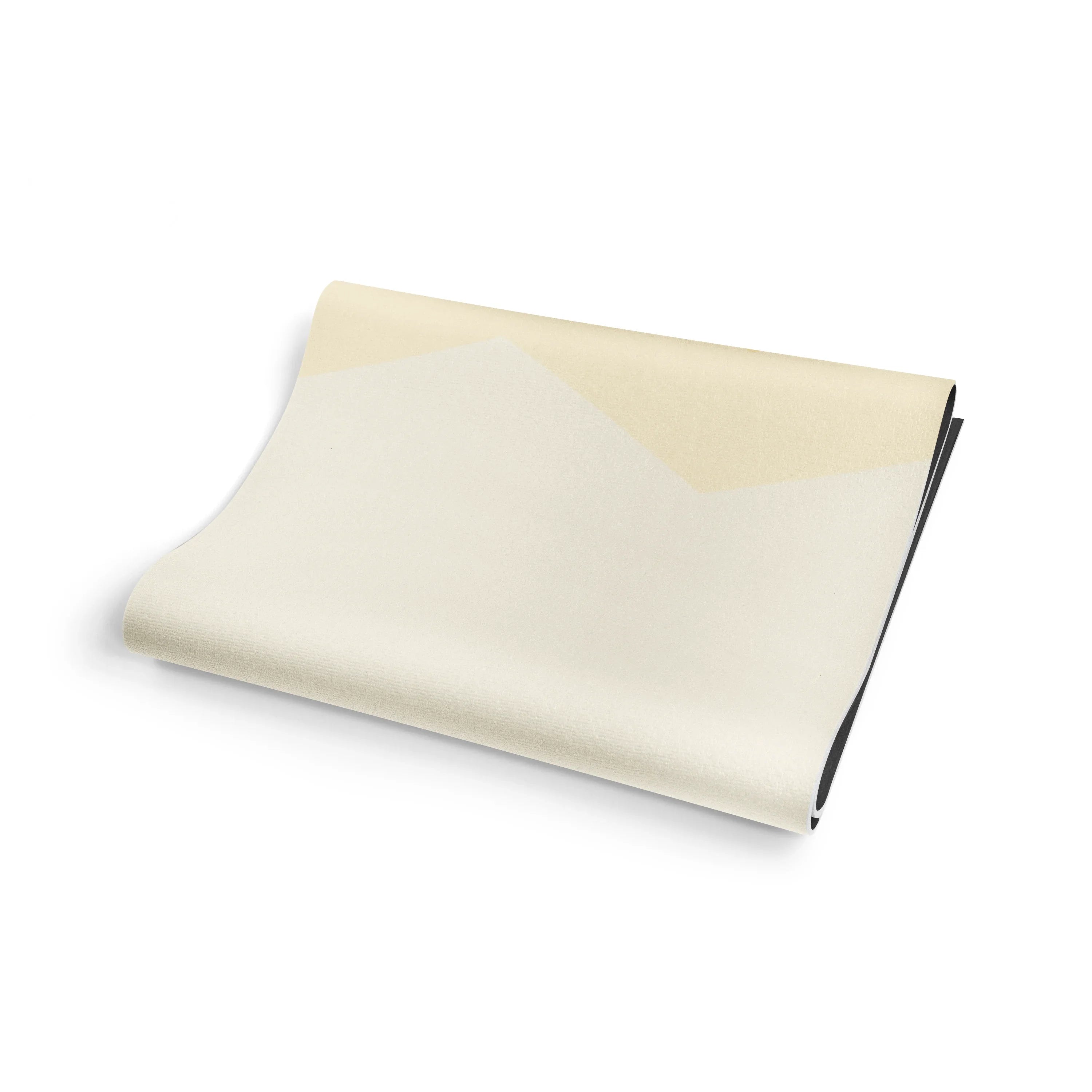 Folded beige fabric on a white background