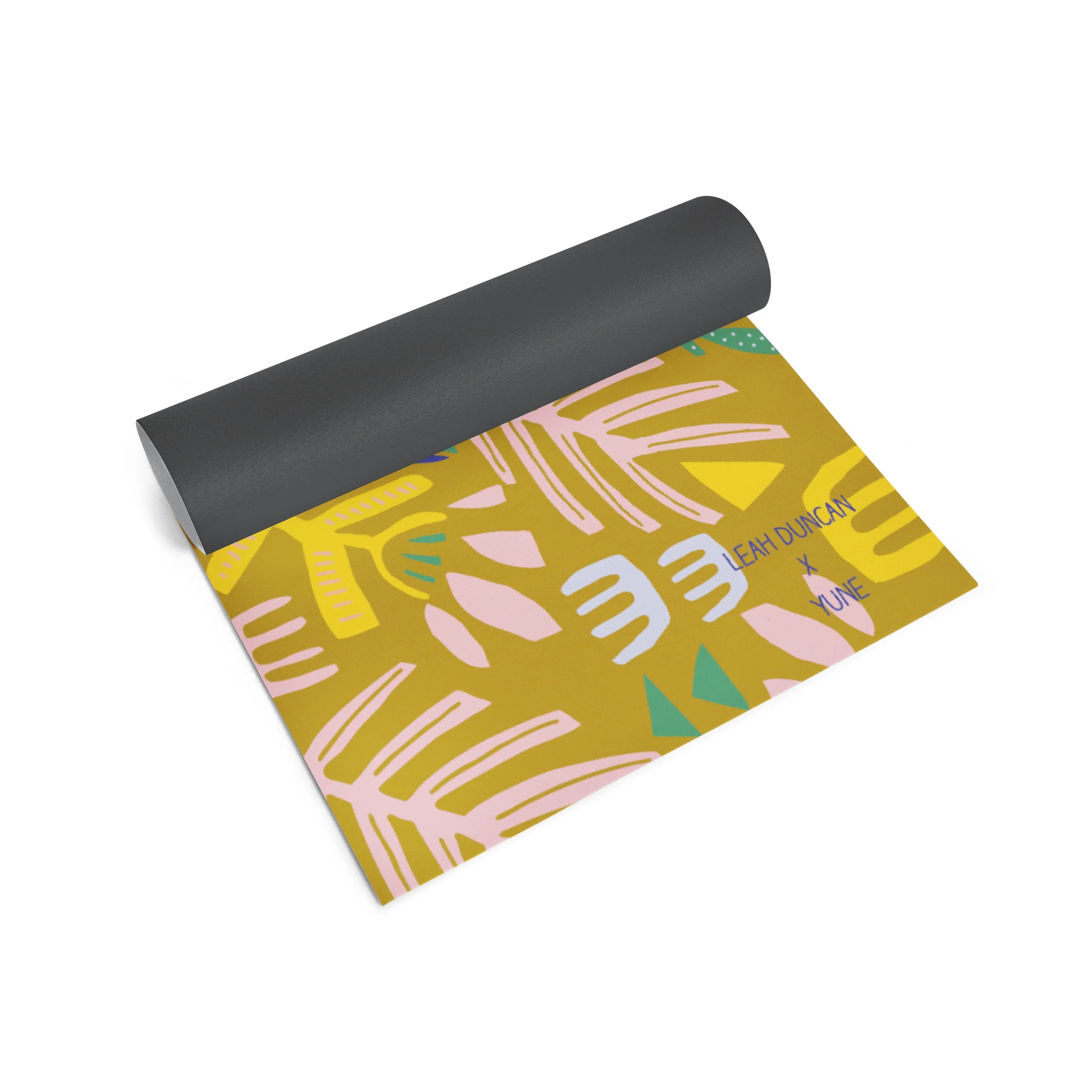 Yoga mat with colorful abstract design on a white background