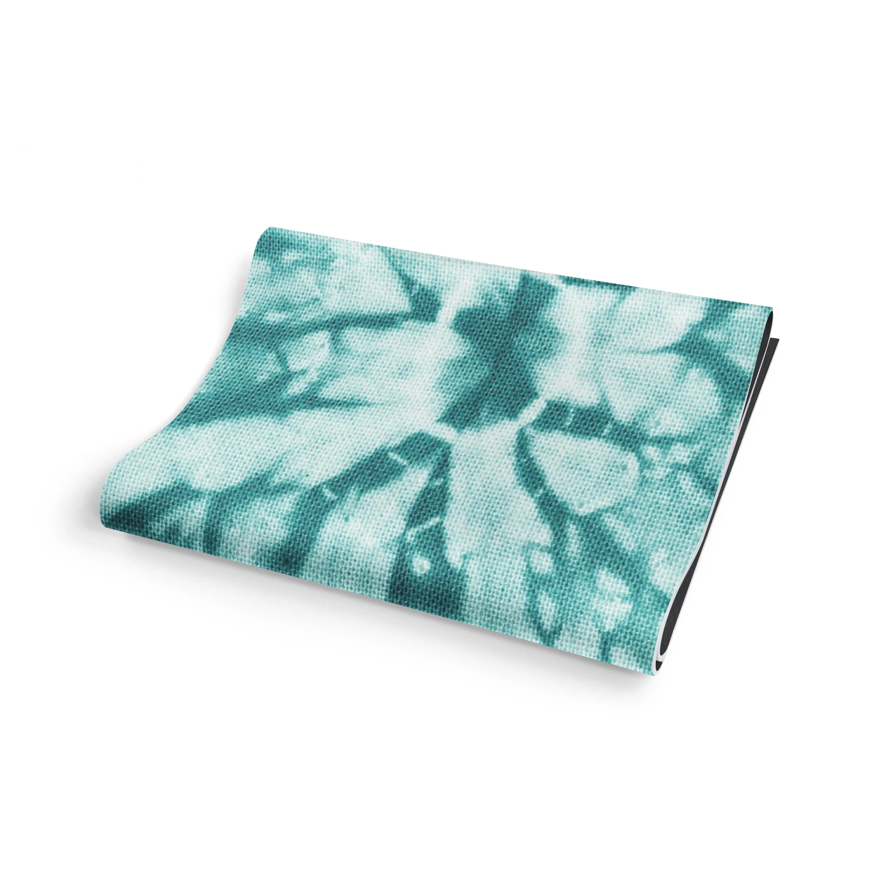 Tie-dye patterned fabric on a white background