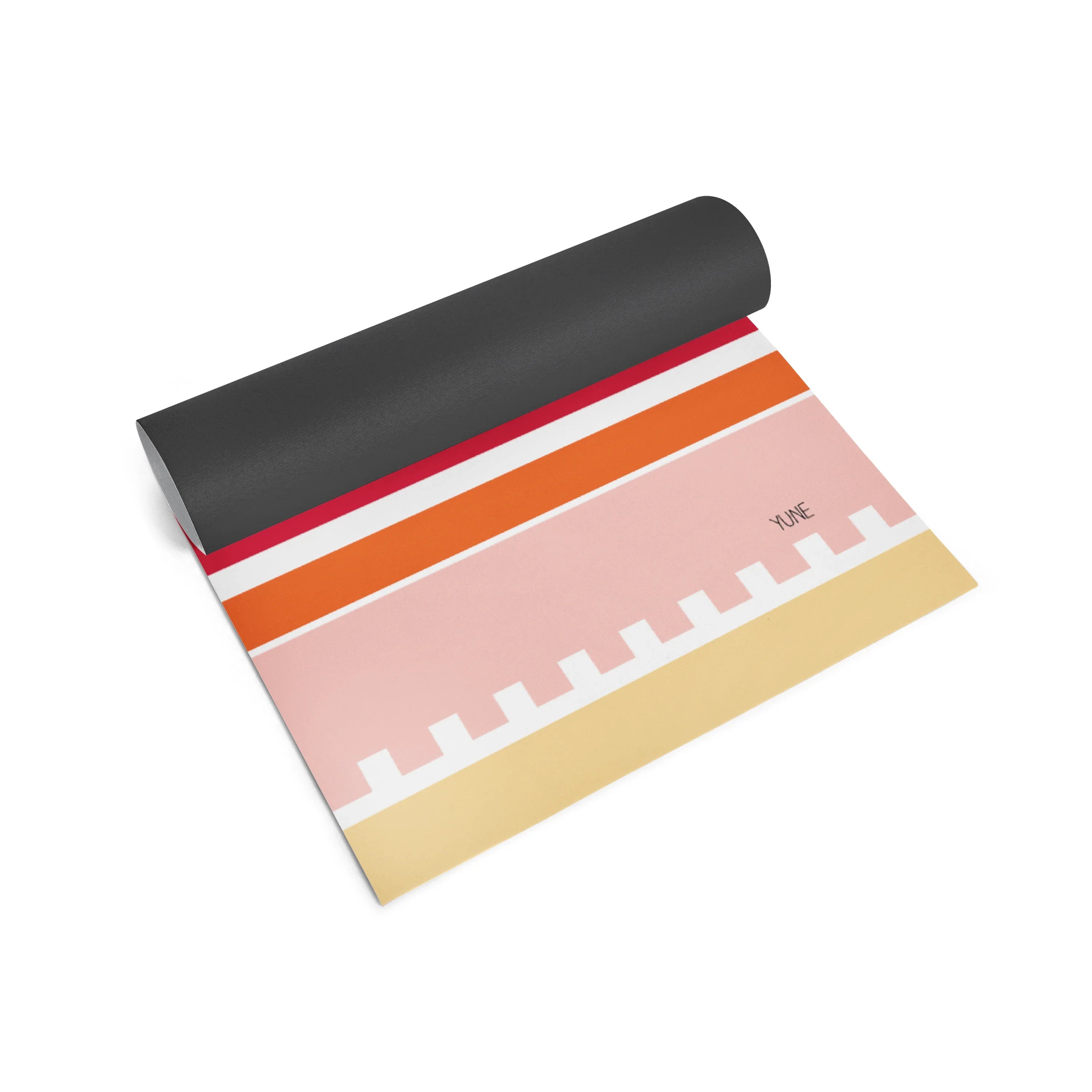 Colorful yoga mat with geometric pattern on a white background