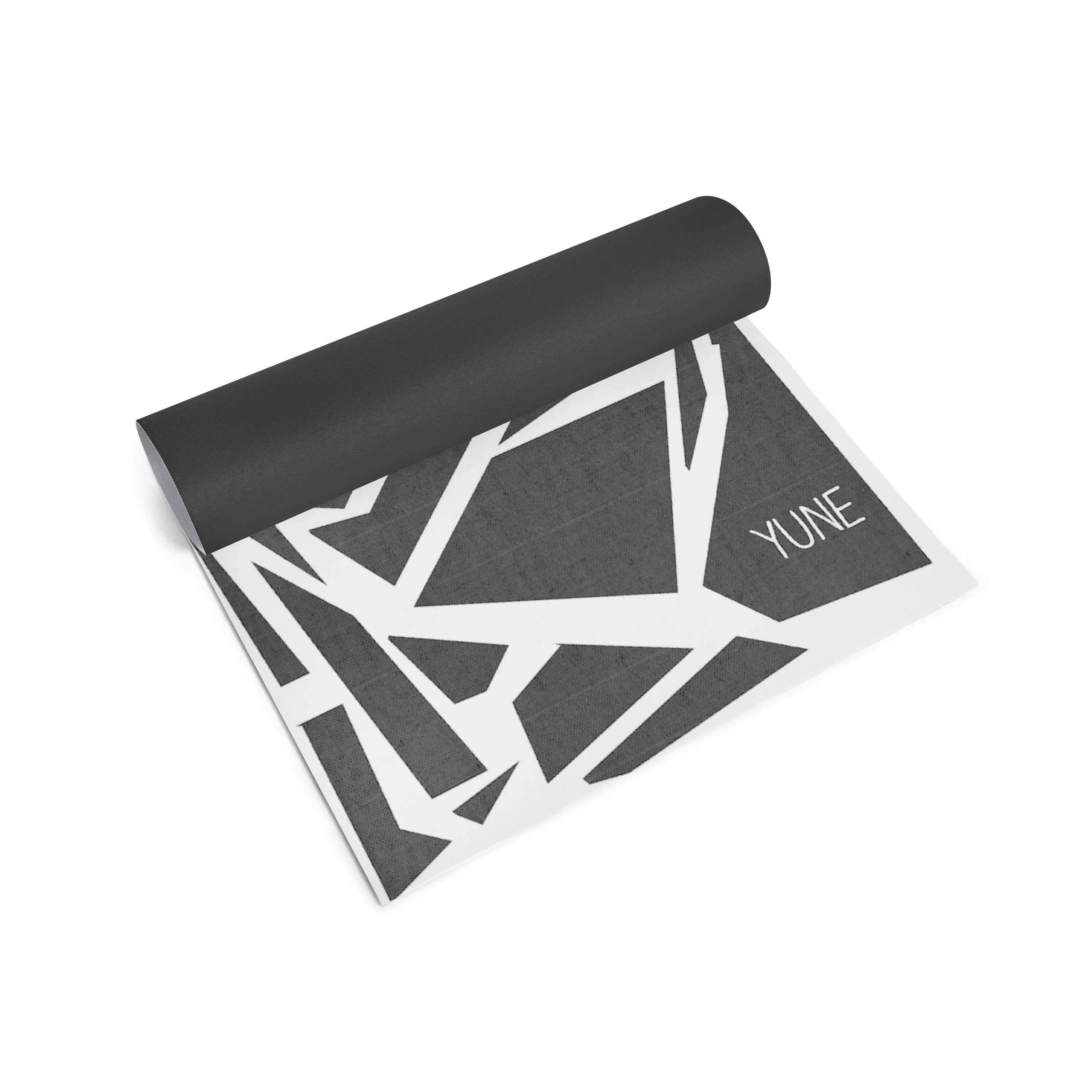 Yoga mat with geometric pattern and 'YUNE' branding on a white background