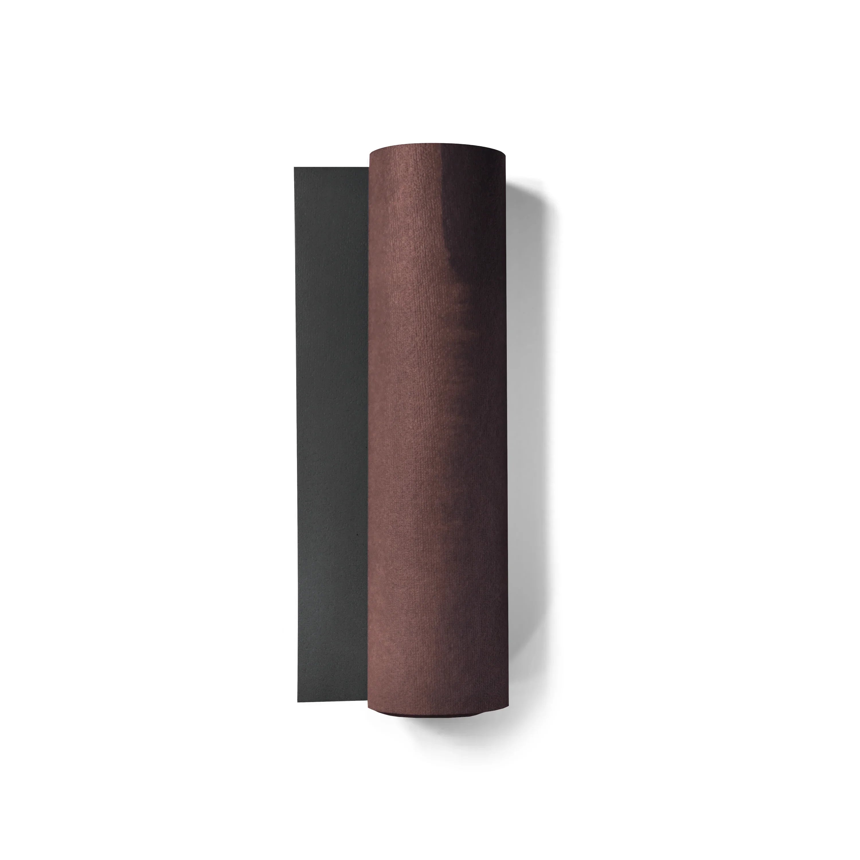Two cylindrical objects, one black and one brown, on a white background