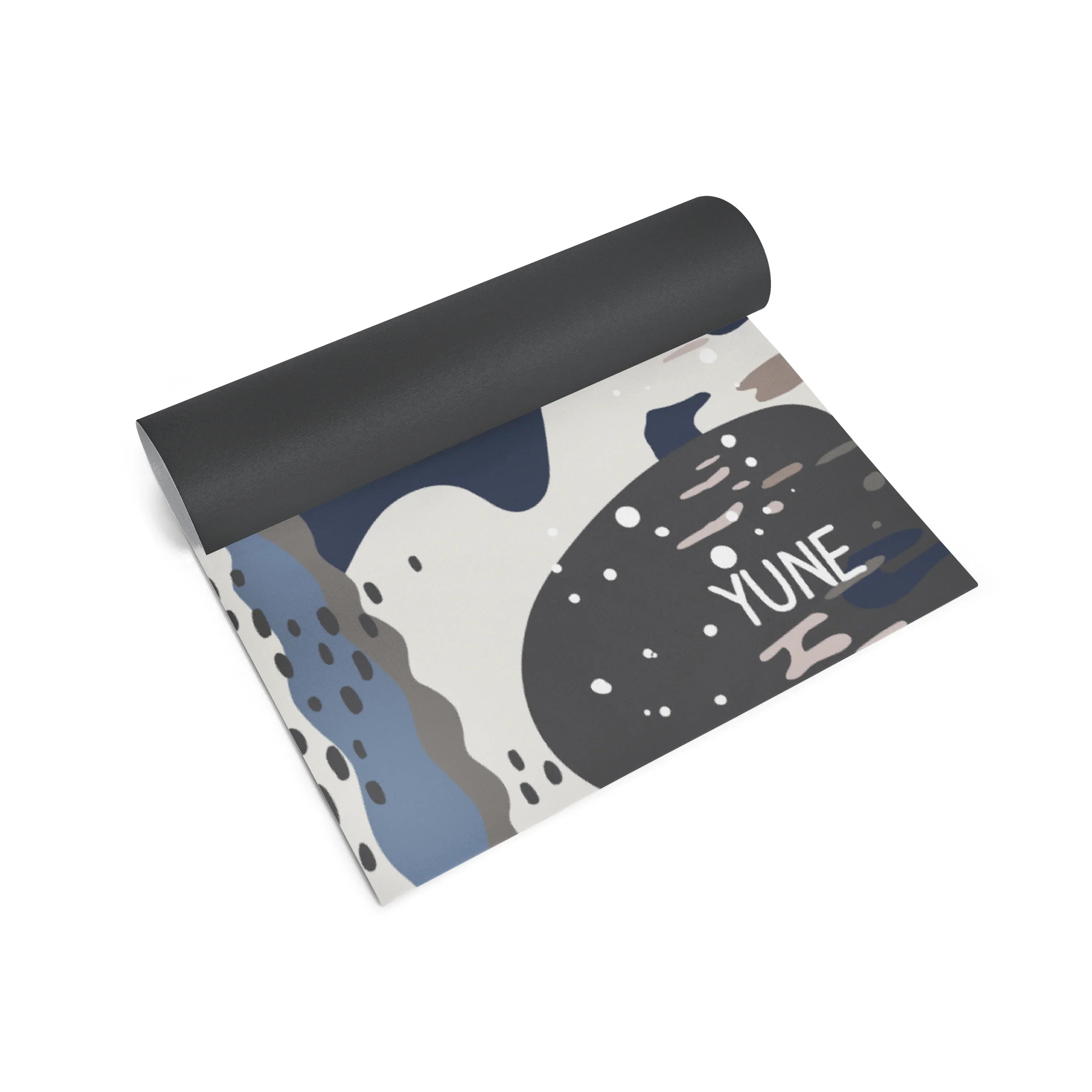 Yoga mat with abstract design and 'YUNE' branding on a white background