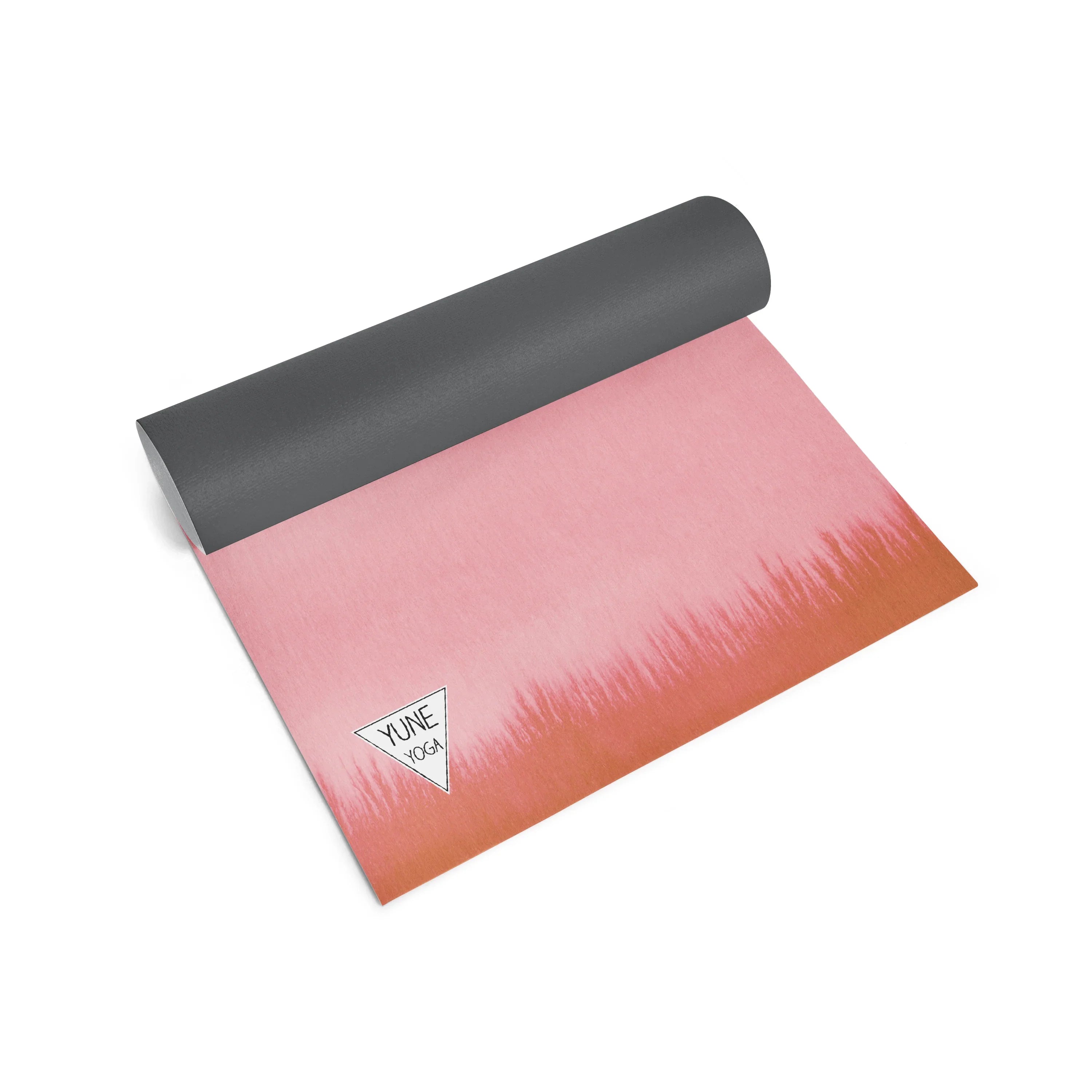 Pink and gray yoga mat with a brand logo on a white background