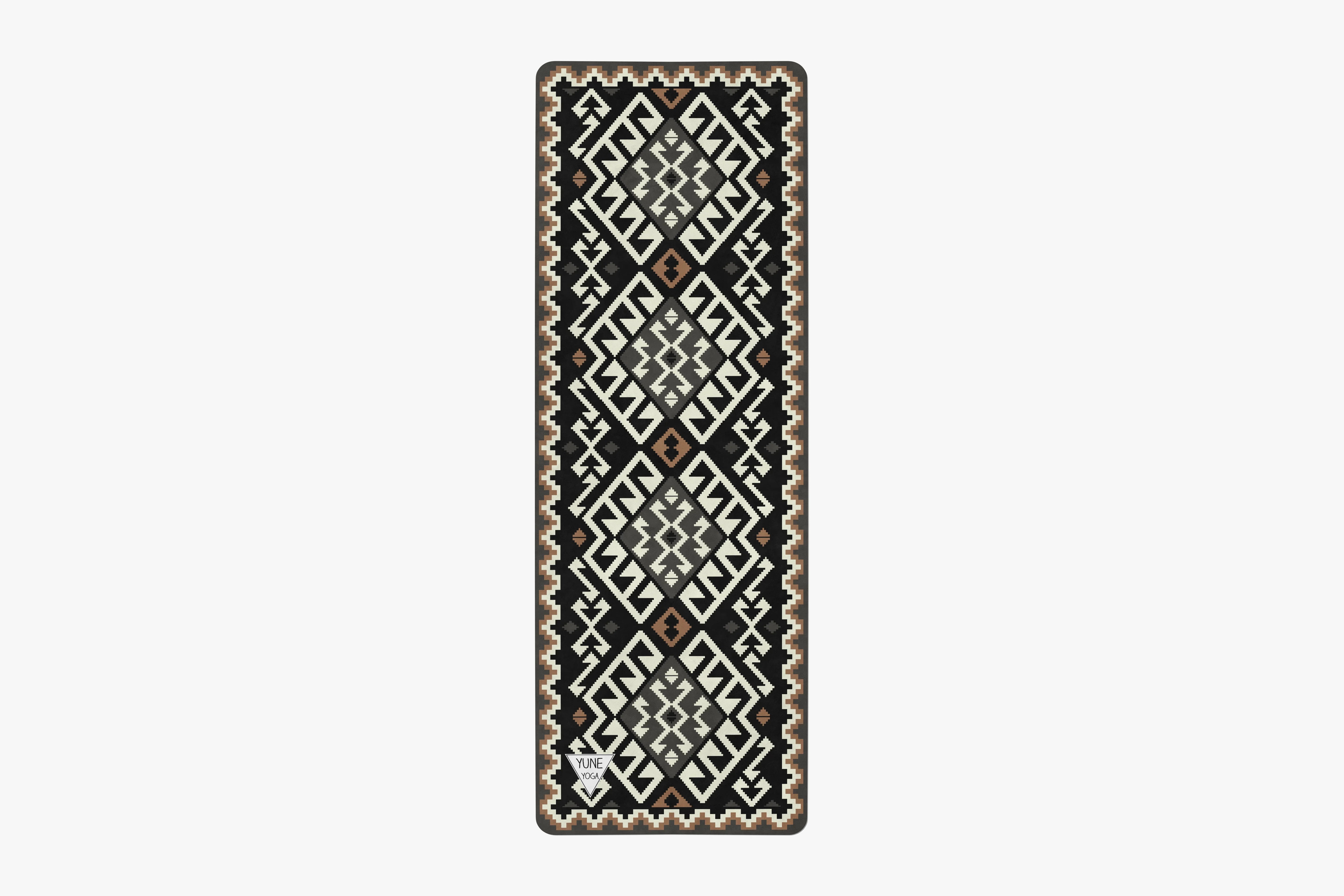 Rectangular rug with a geometric pattern on a white background