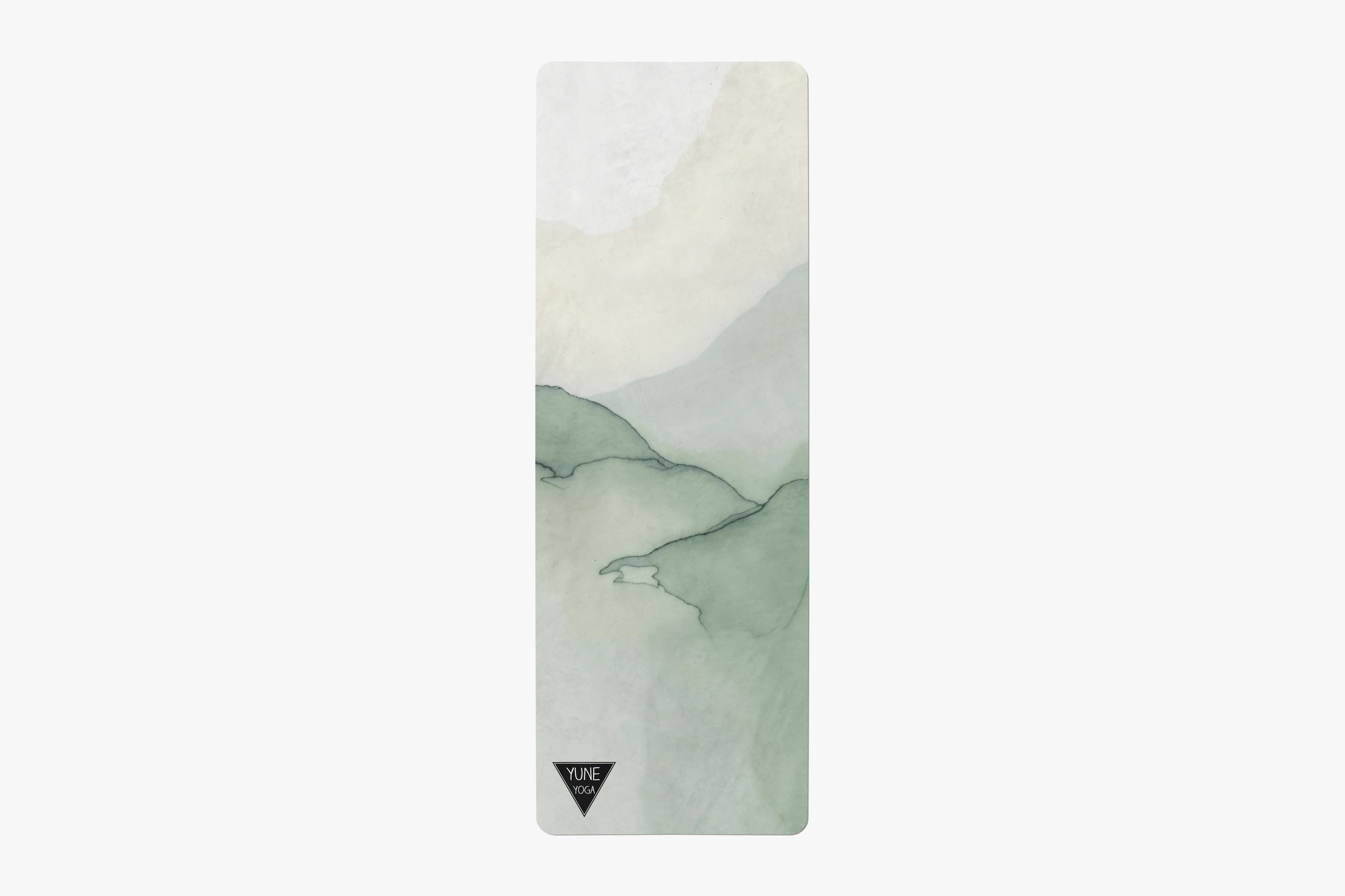 Yoga mat with a nature-themed design on a white background