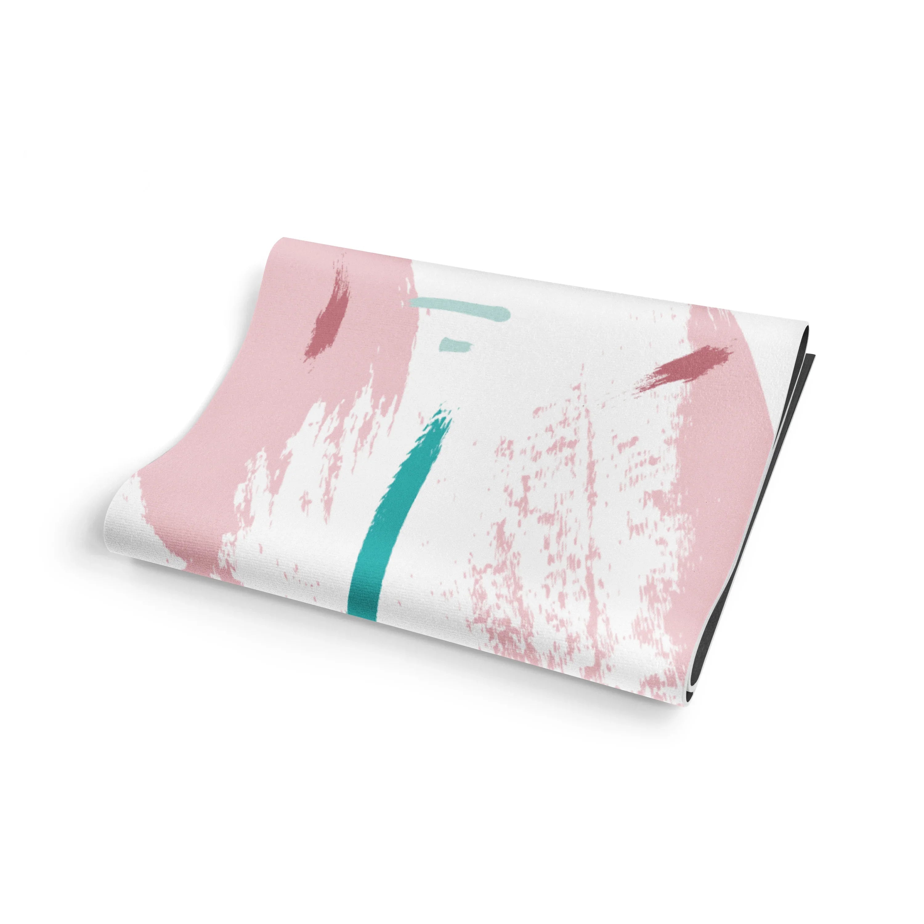 Folded fabric with pink and green abstract design on a white background