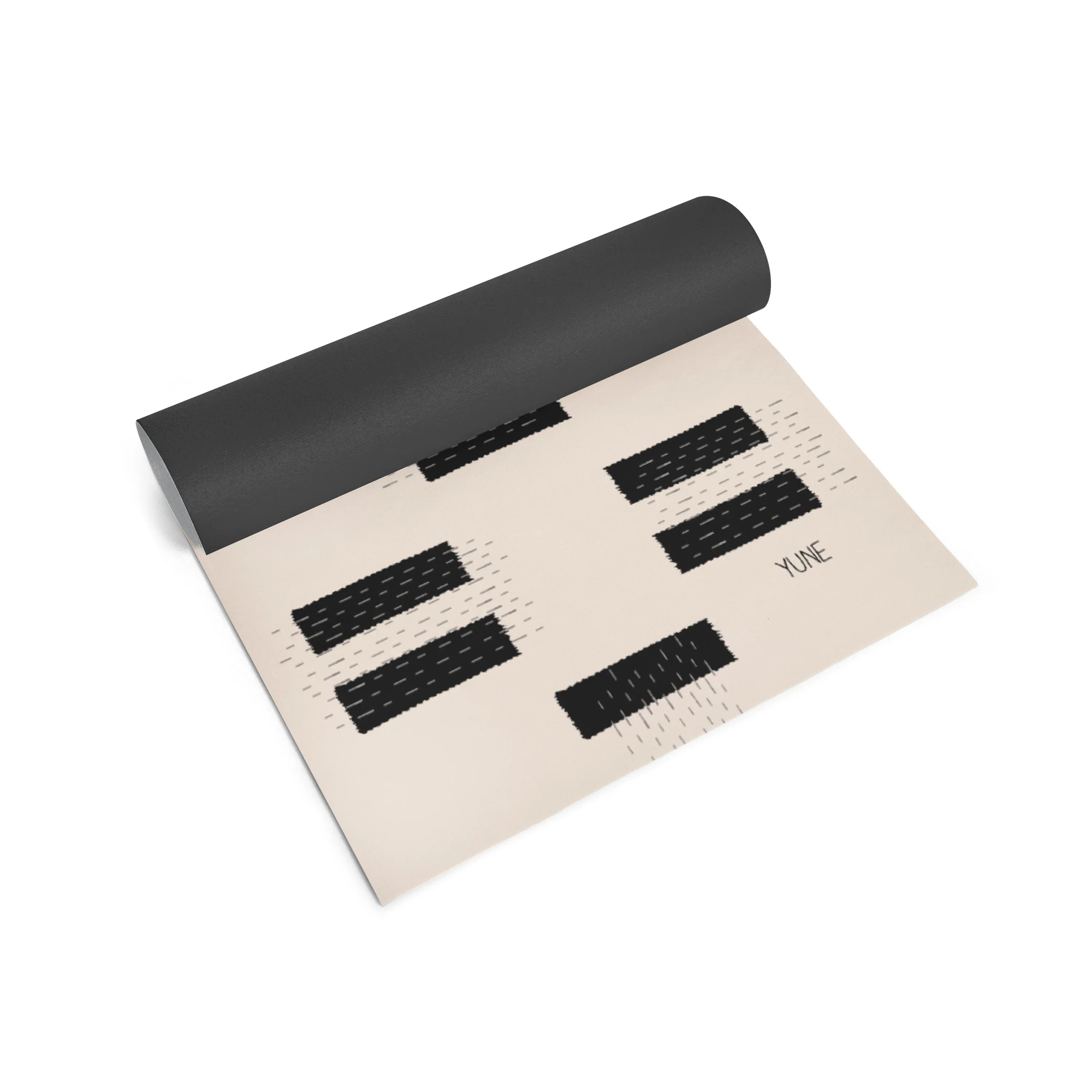 Yume yoga mat with black textured design on a white background