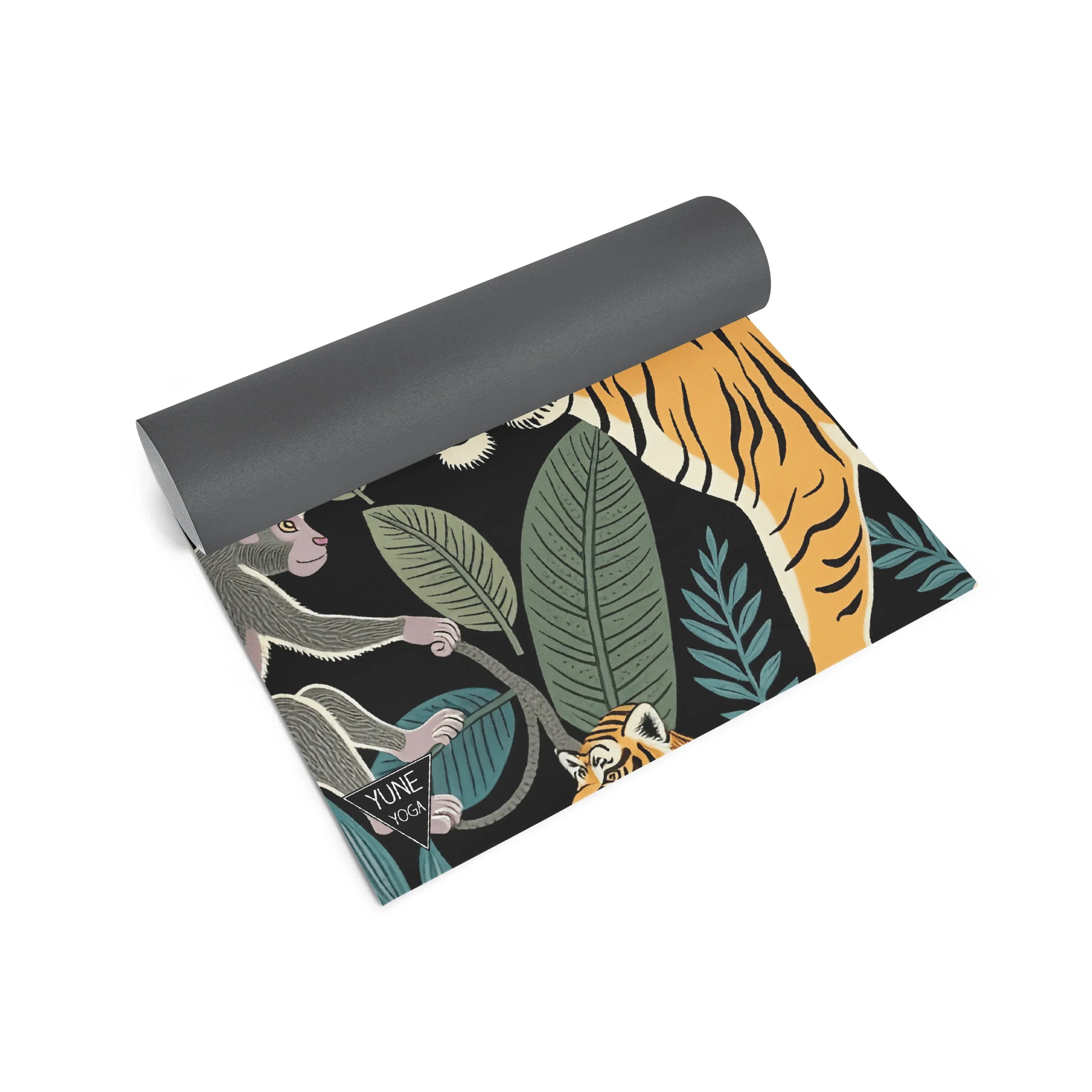 Yoga mat with jungle animal design on a white background