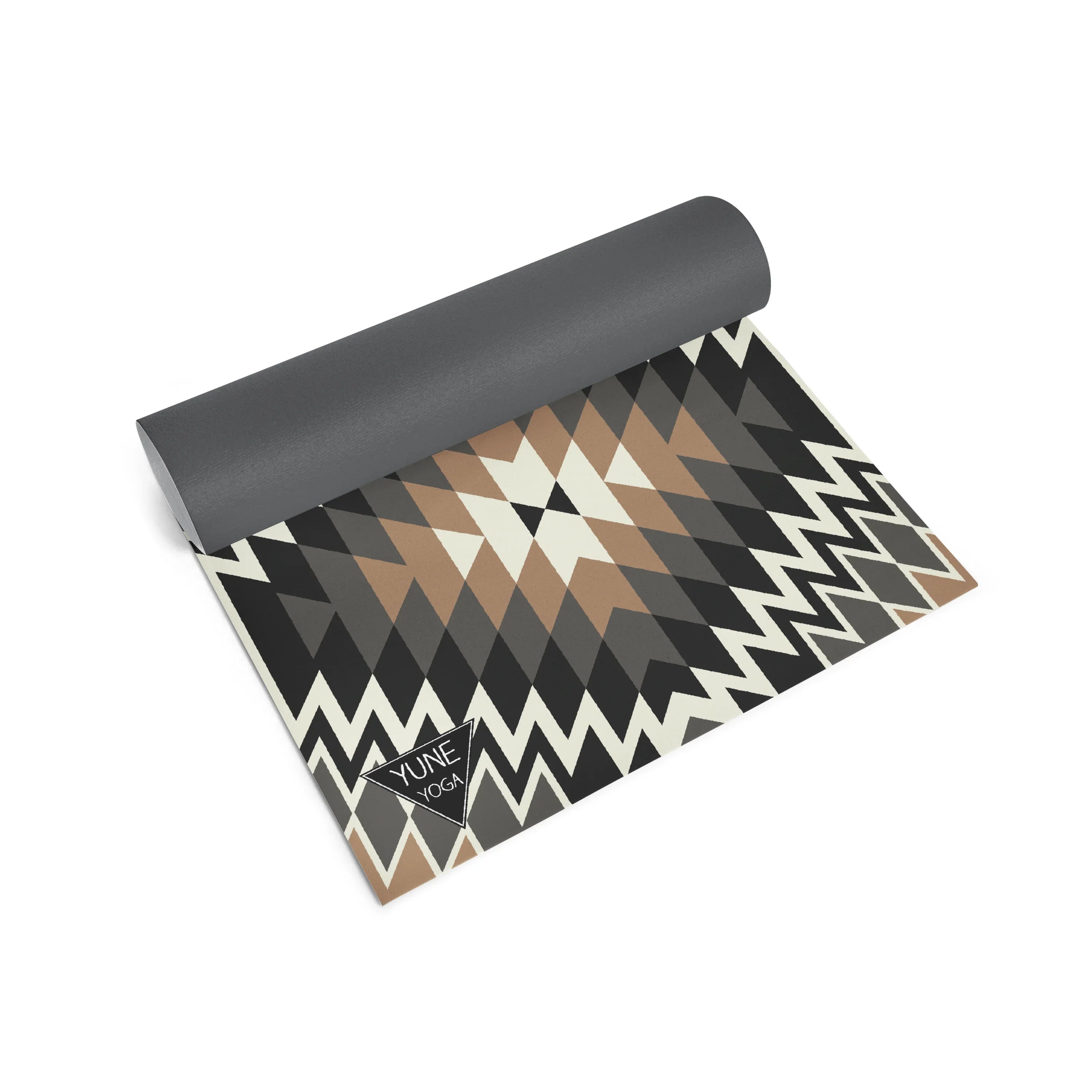 Yoga mat with geometric pattern on a white background