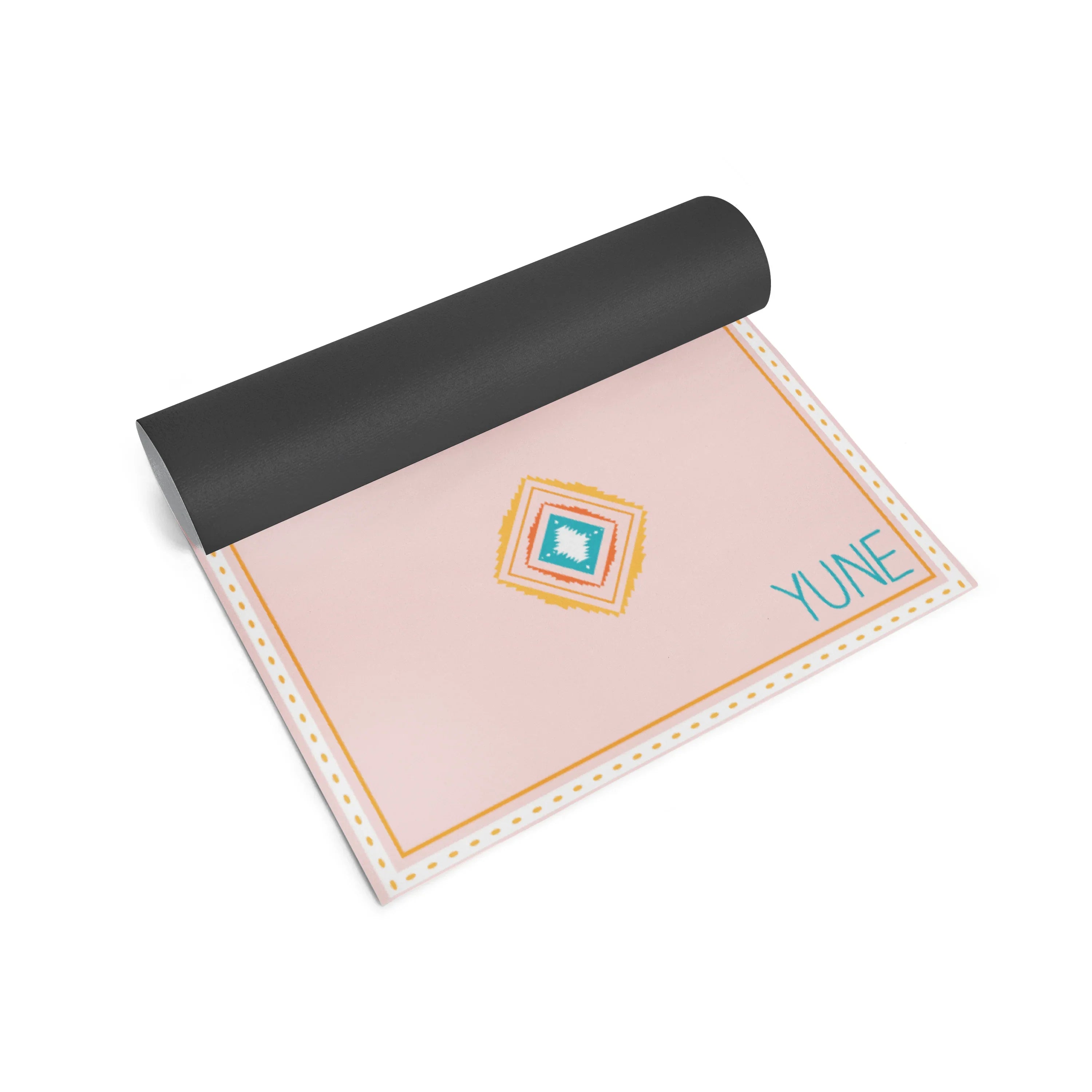 Yoga mat with a pink design and 'Yune' branding on a white background