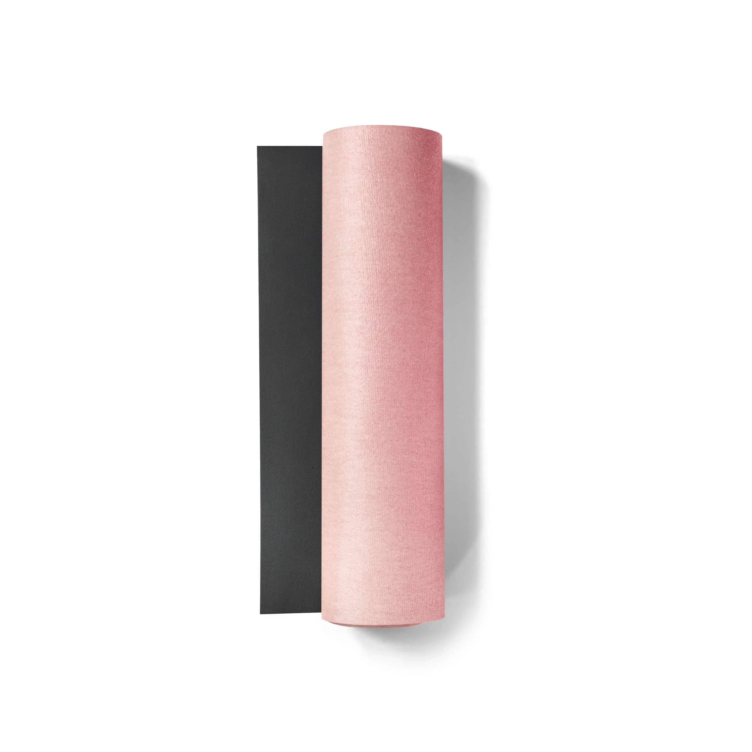 Black and pink yoga mats on a white background