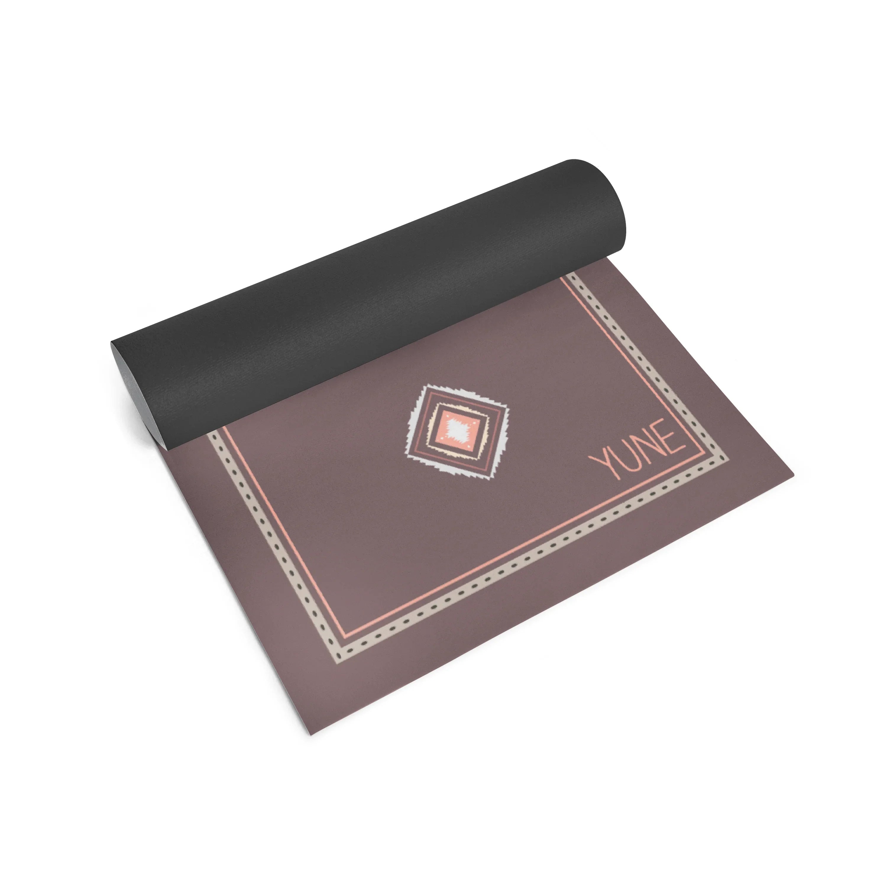 Yoga mat with a decorative border and 'YUNE' branding on a white background