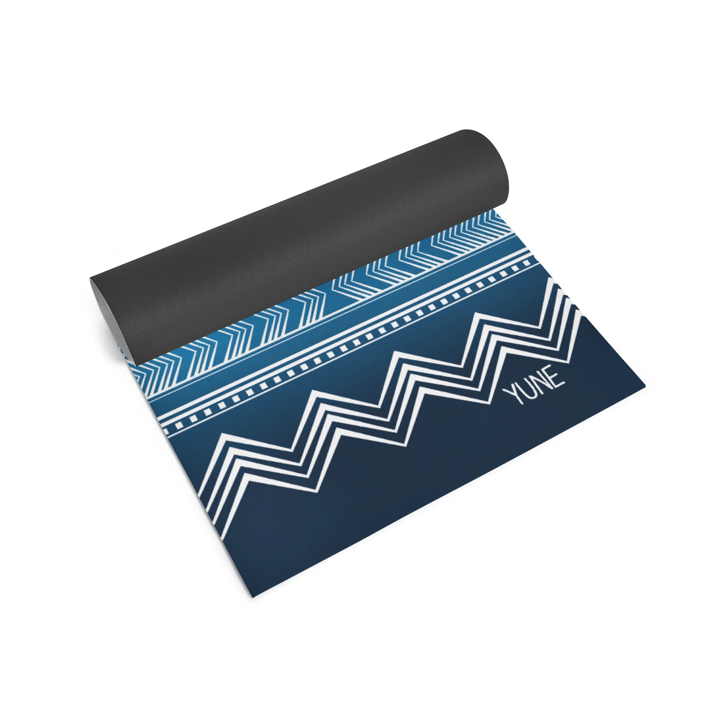 Yoga mat with blue and white zigzag pattern on a white background