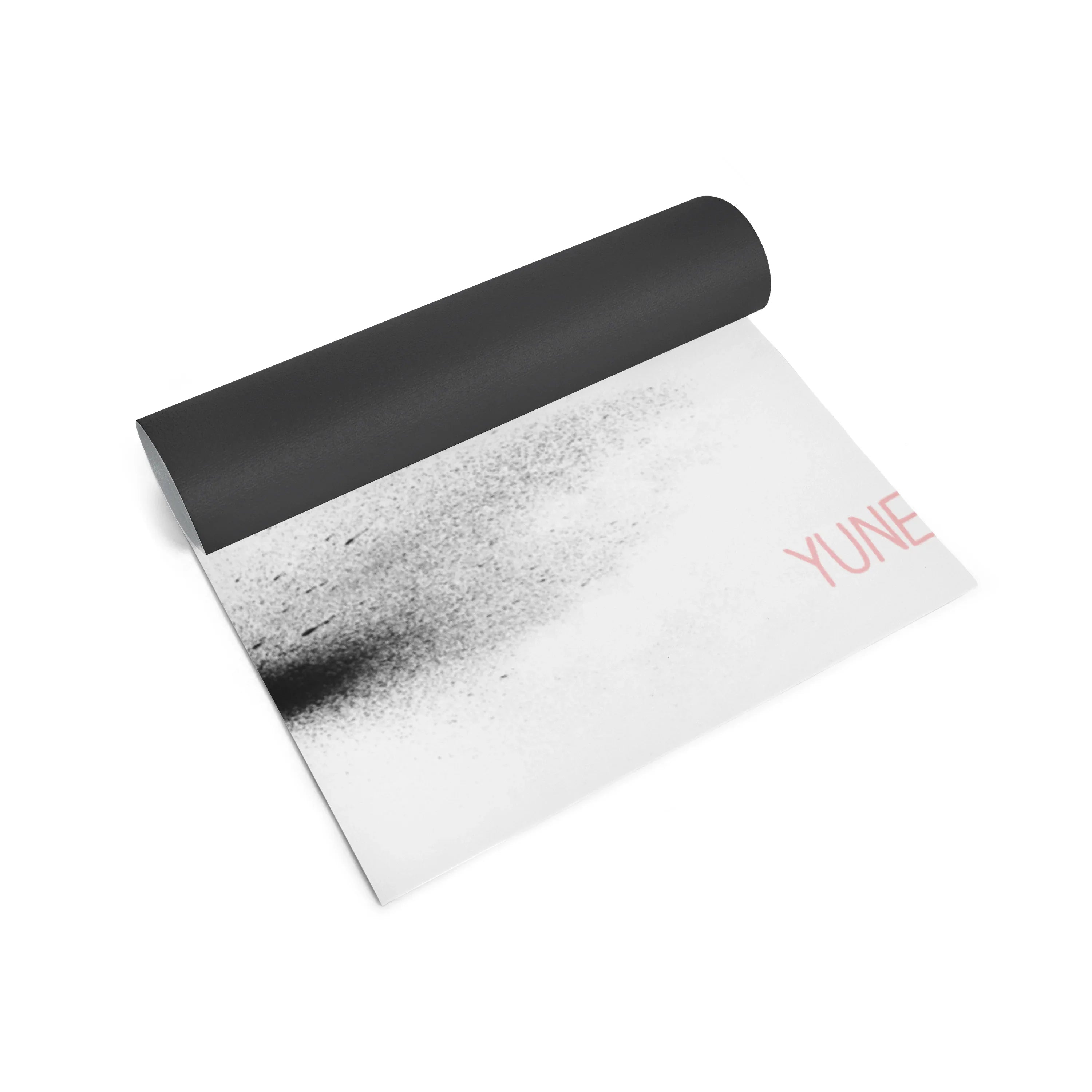 Yoga mat with black top and gradient design on a white background