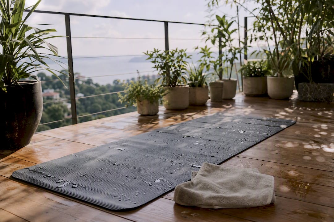 Yoga mat drying flat indoors in humid environment