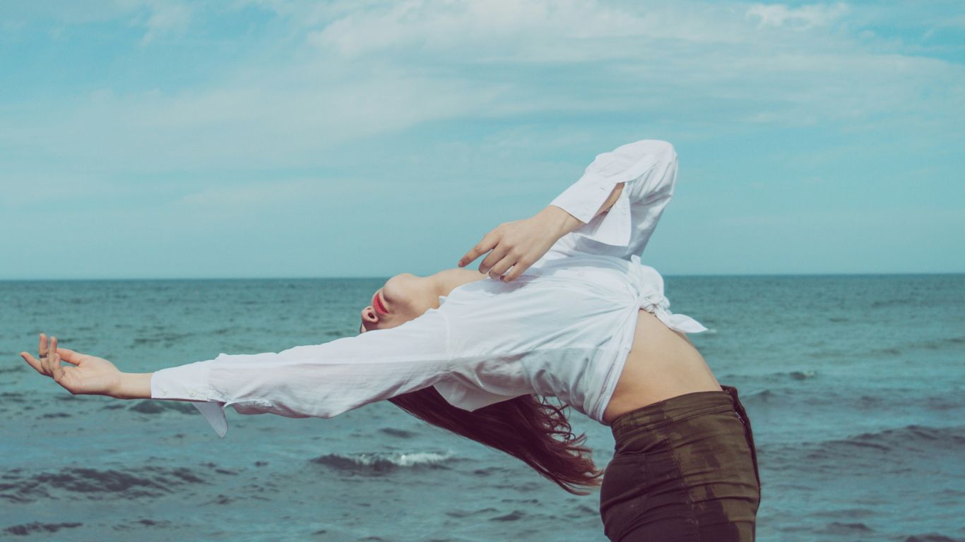 person in white long-sleeved shirt