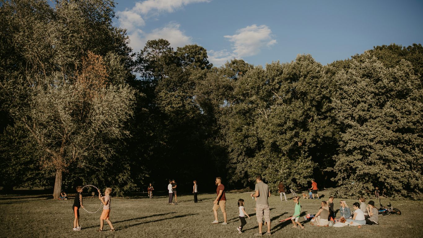 a group of people in a park