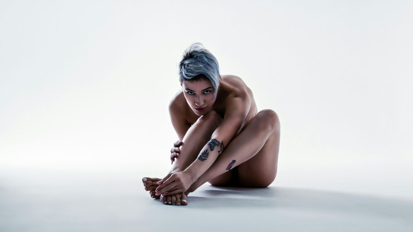 woman sitting in white background