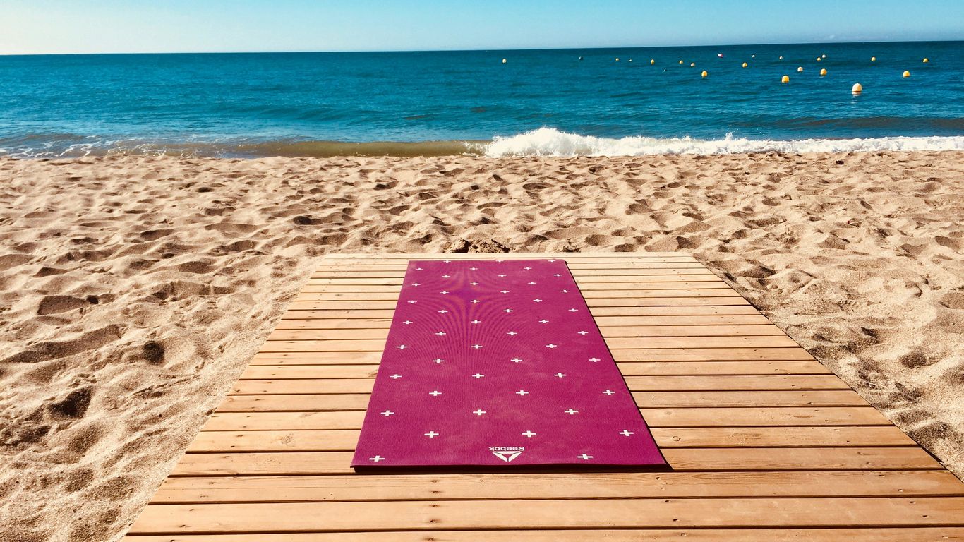 Hot yoga mat towel: How to choose, use, and care for the right one