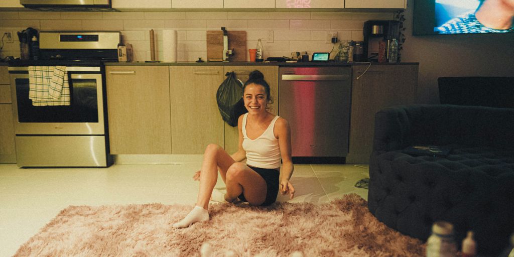 a woman sitting on the floor