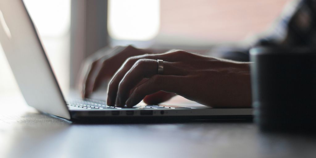 person using laptop