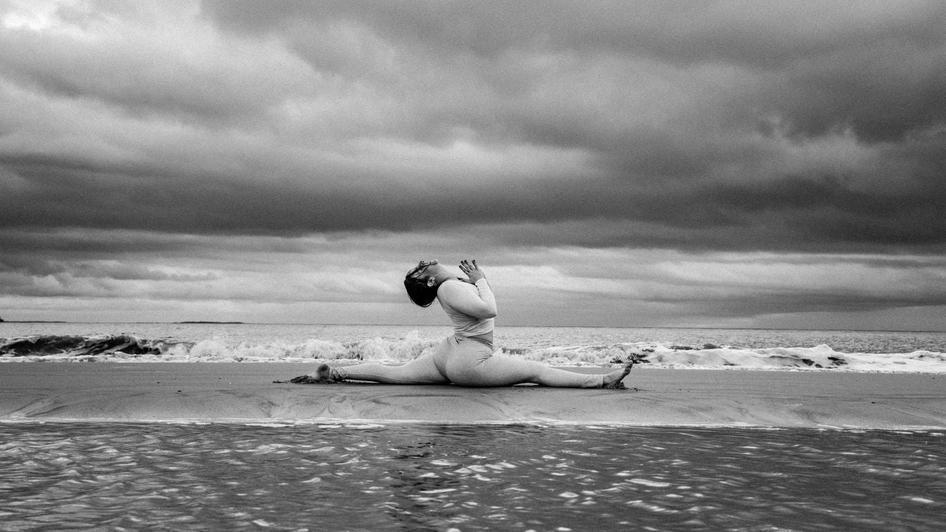 person splitting on seashore