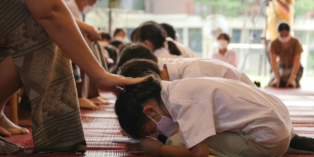 a group of people doing yoga