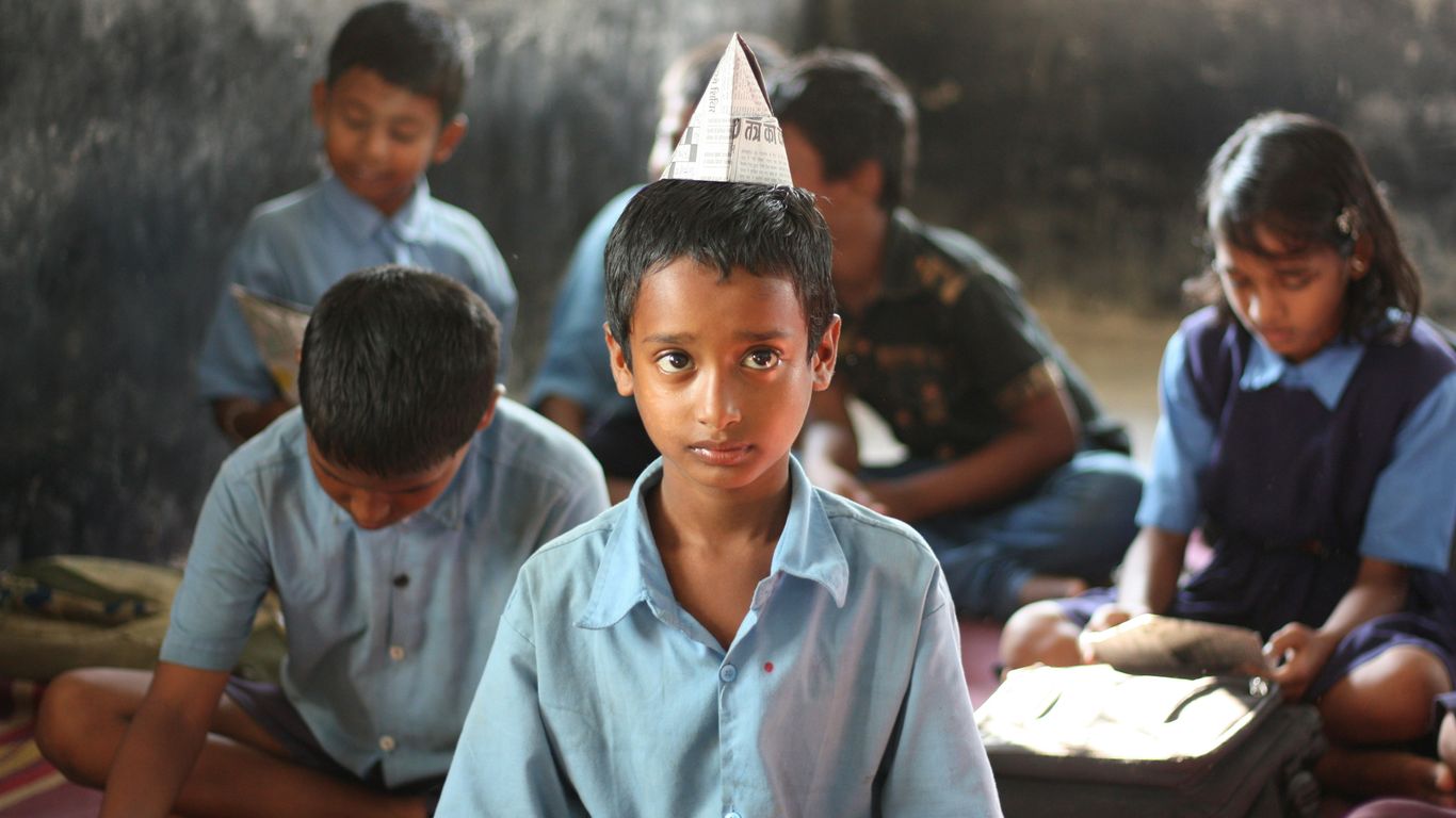 boy wearing blue dress shirt