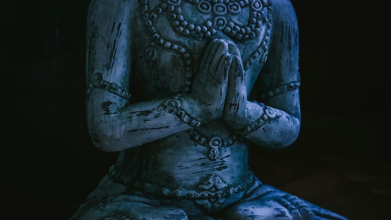 sitting human statue