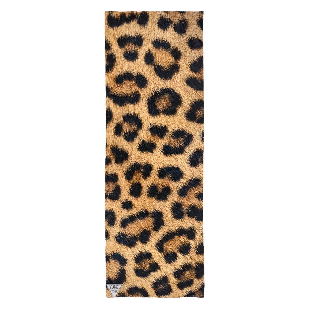 Leopard print yoga mat with textured brown and black animal pattern