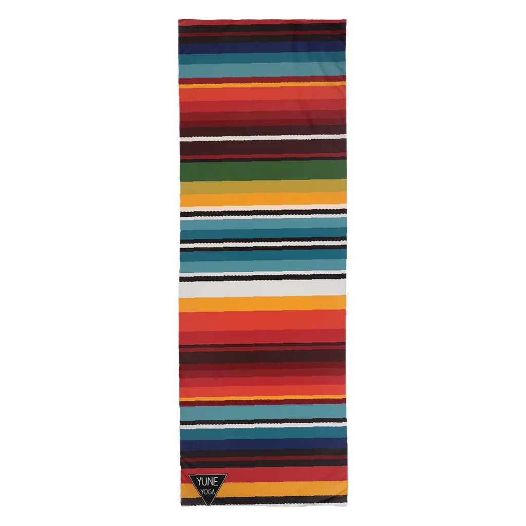 Colorful striped yoga mat with bold horizontal bands, soft texture, and geometric pattern.