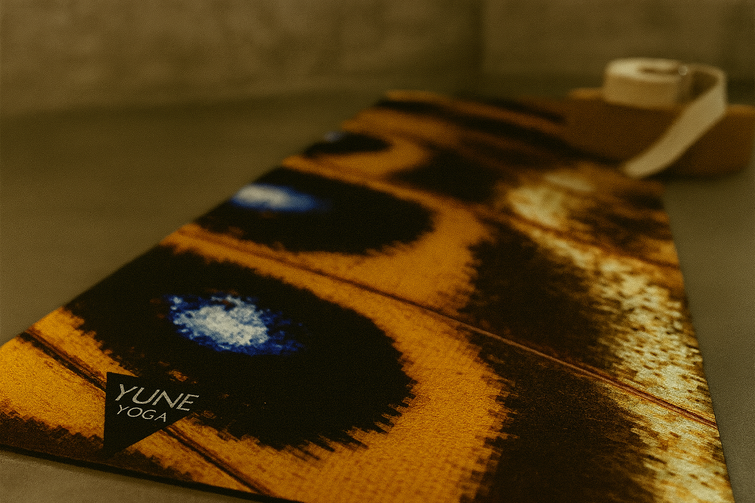 Yume Yoga mat with brand logo on a neutral background