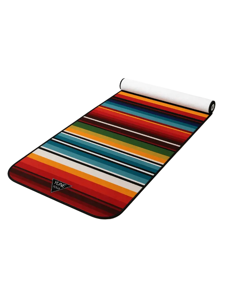 Colorful yoga mat with bold multicolor stripes and a rolled white edge, ideal for workouts