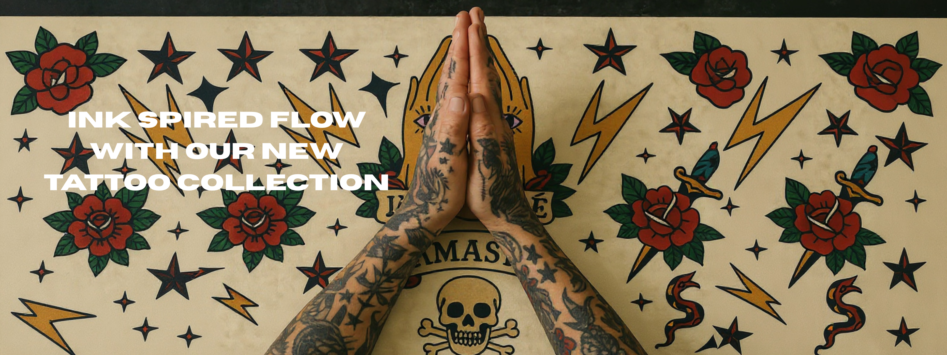 Tattooed hands in a prayer position with a vintage tattoo design background featuring roses, stars, and lightning bolts.