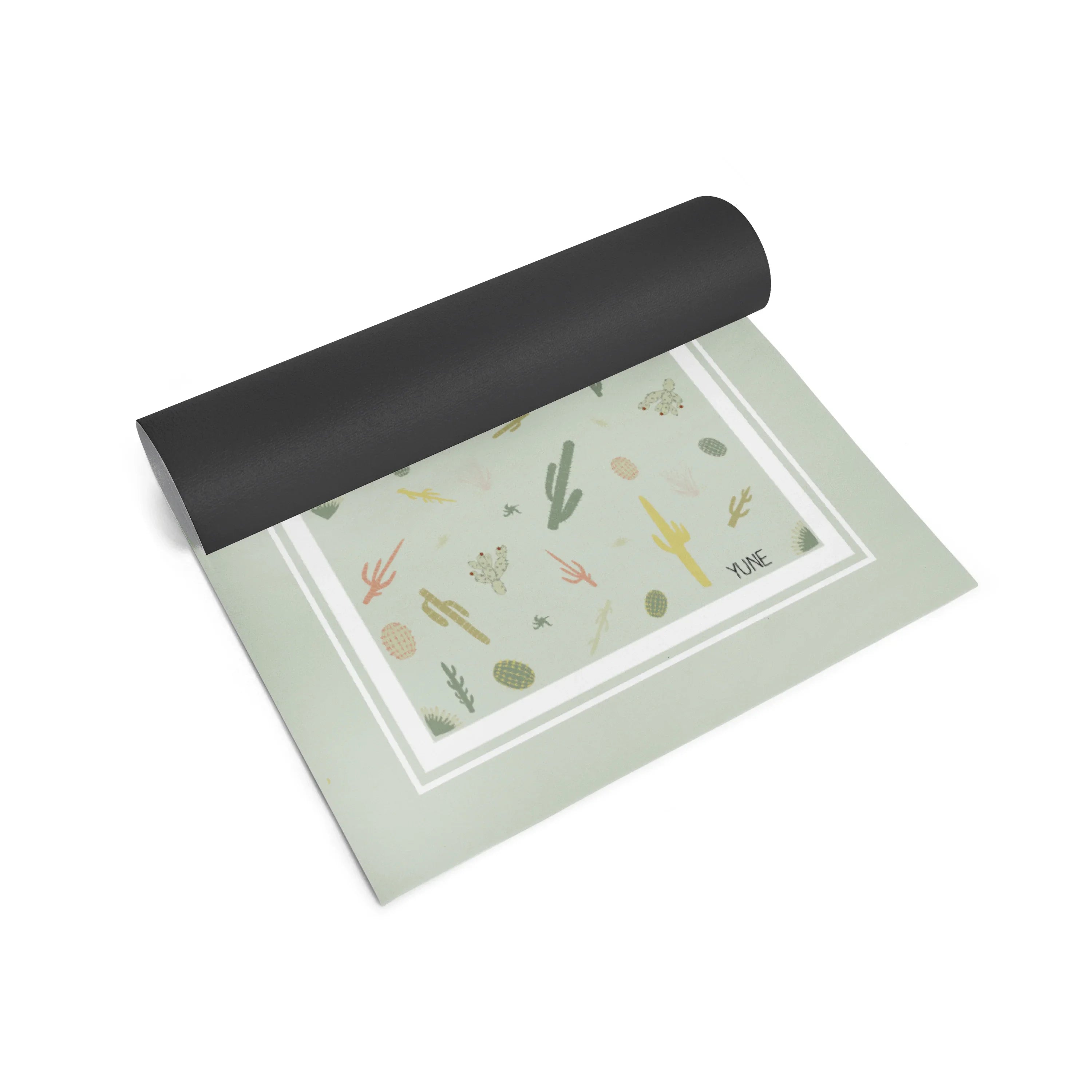 Roll of paper with cactus pattern on a white background