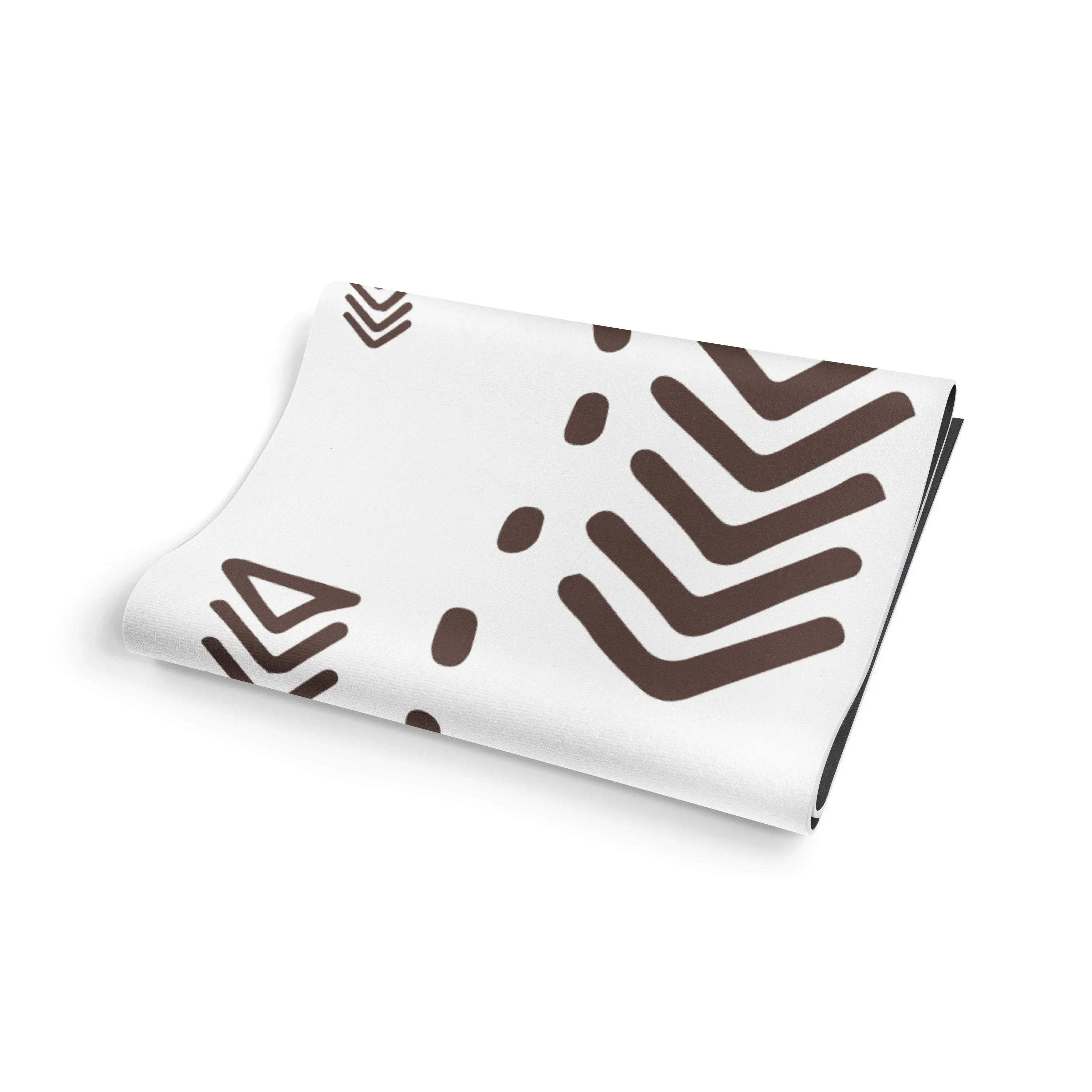 Folded fabric with brown abstract patterns on a white background