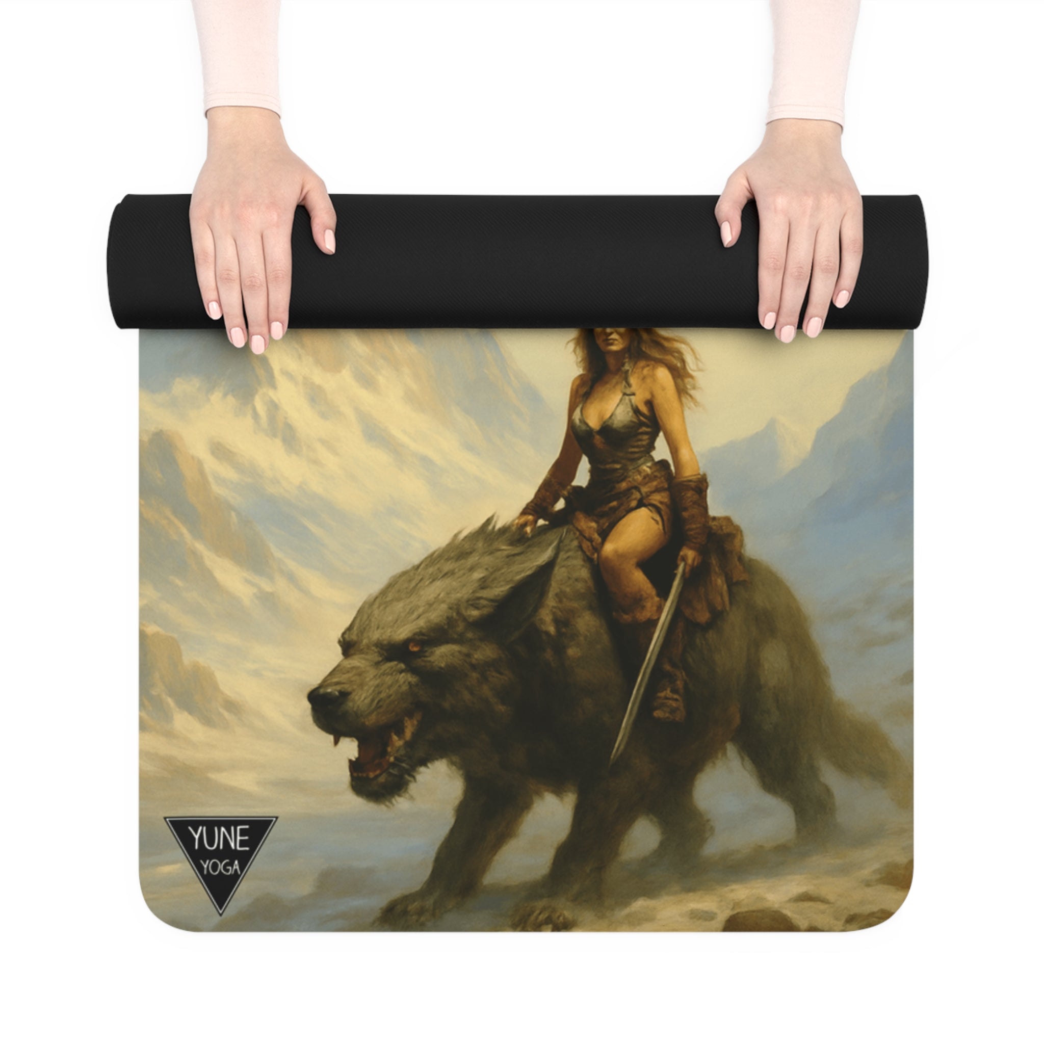 Yoga mat with a fantasy design of a warrior on a lion, held by hands against a white background.