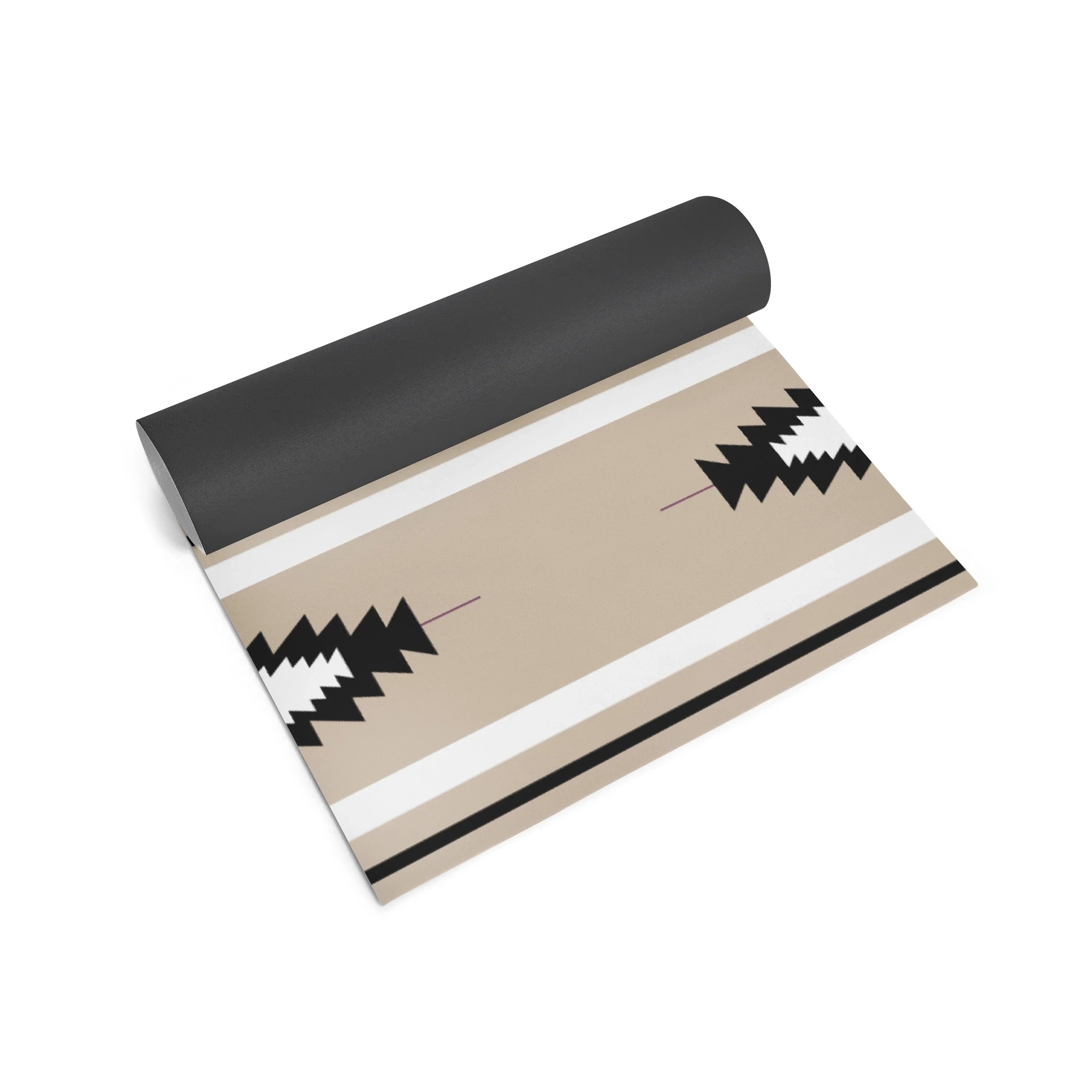 Yoga mat with black, white, and beige pattern on a white background