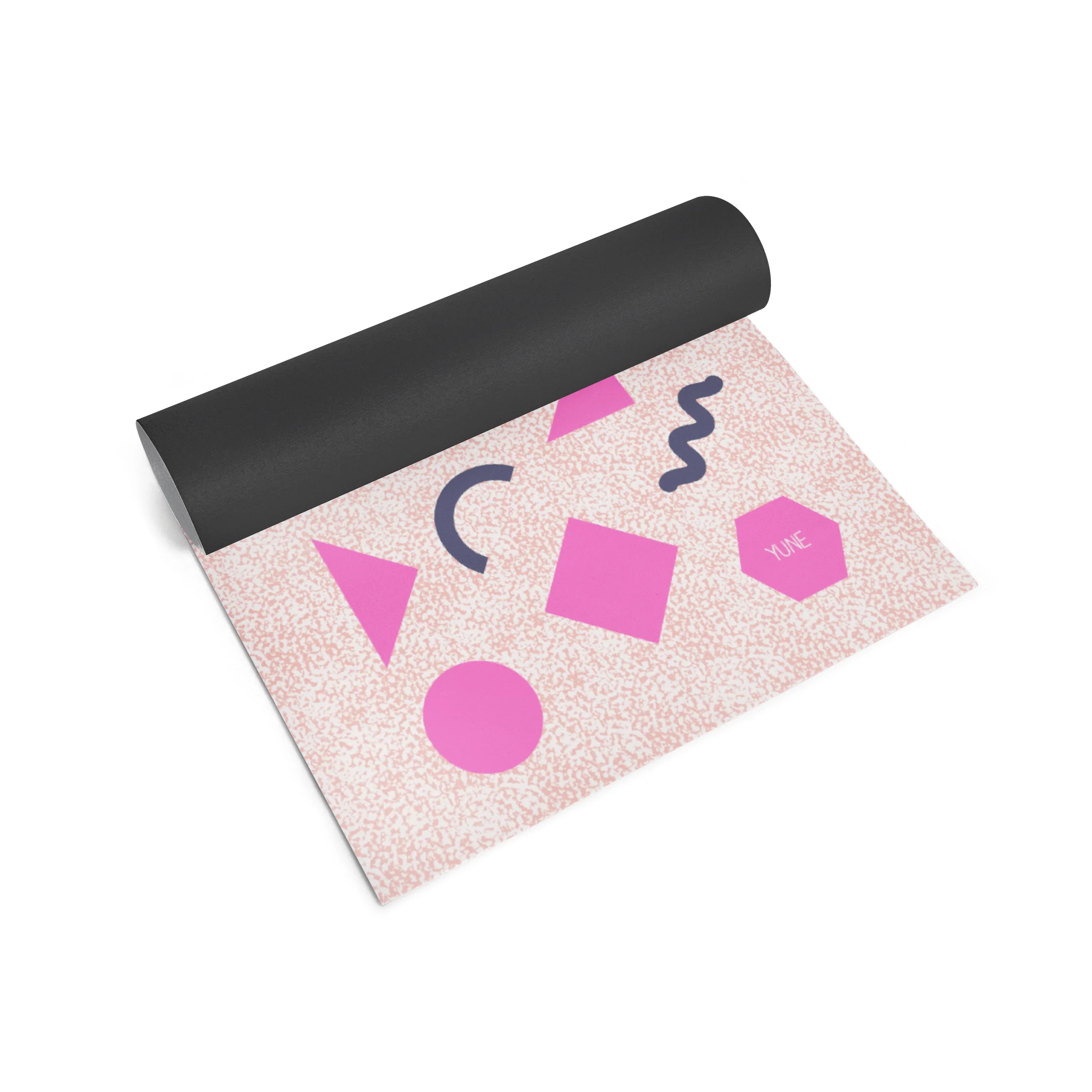 Yoga mat with geometric shapes on a white background